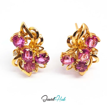 Four oval pink sapphires per earring set at overlapping angles - JewelHub
