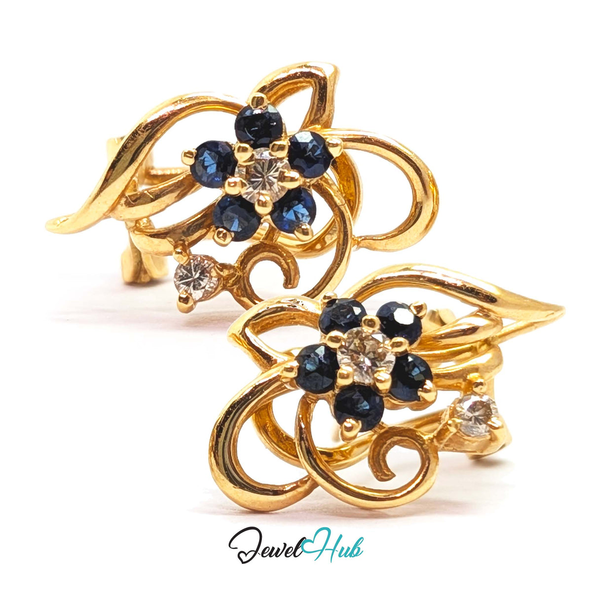 Five round blue sapphires, about 2.8mm each, forming the petals of a flower - JewelHub