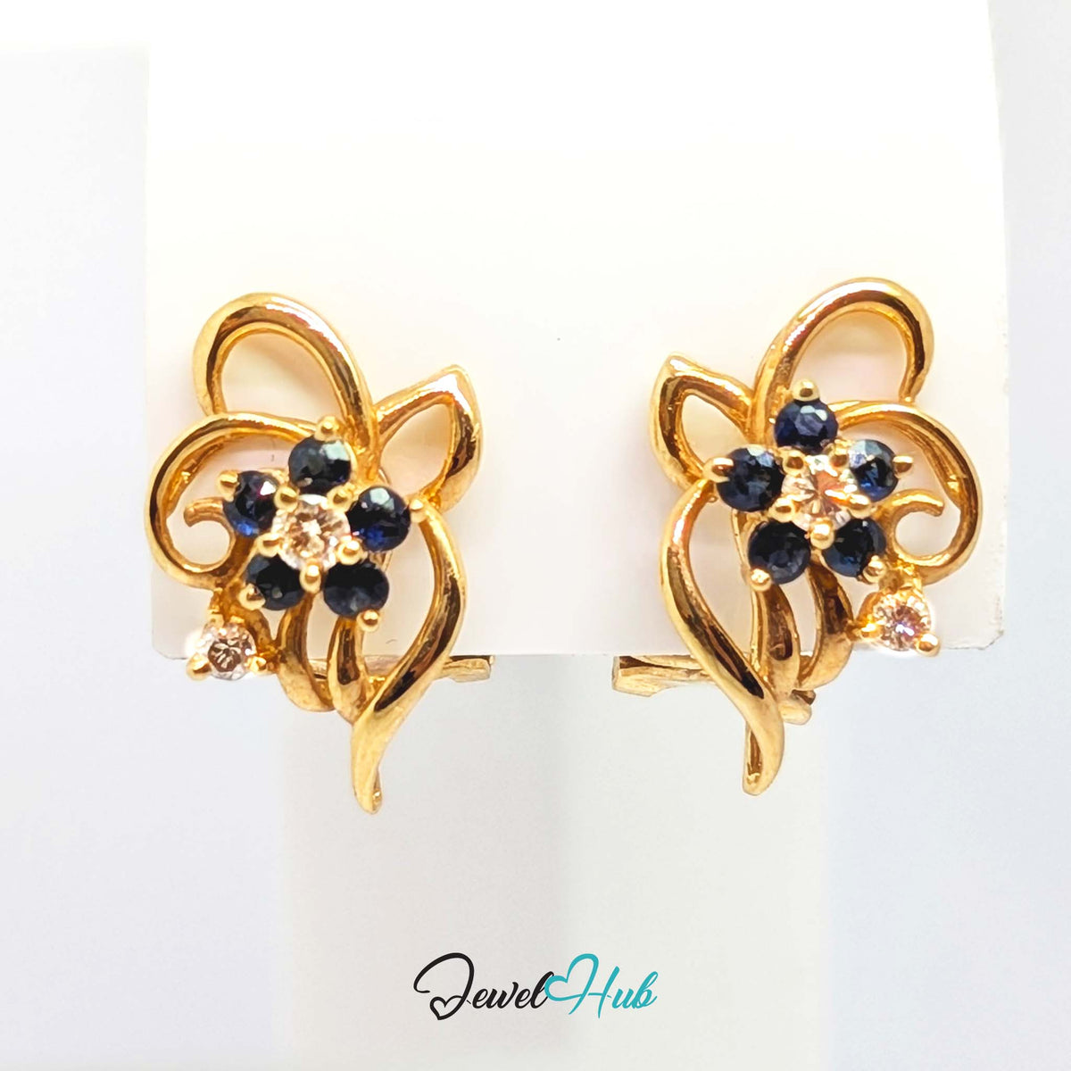Post with clip fitting behind the sapphire flower earring - JewelHub