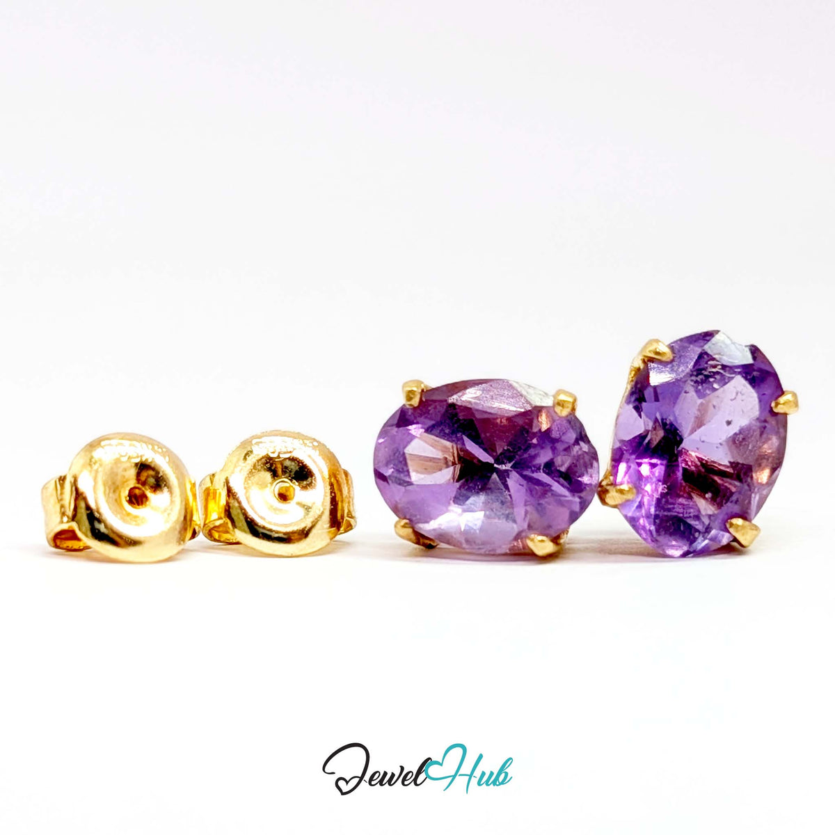 Oval amethyst, 8 x 6mm, held in four plain 14k gold claws - JewelHub