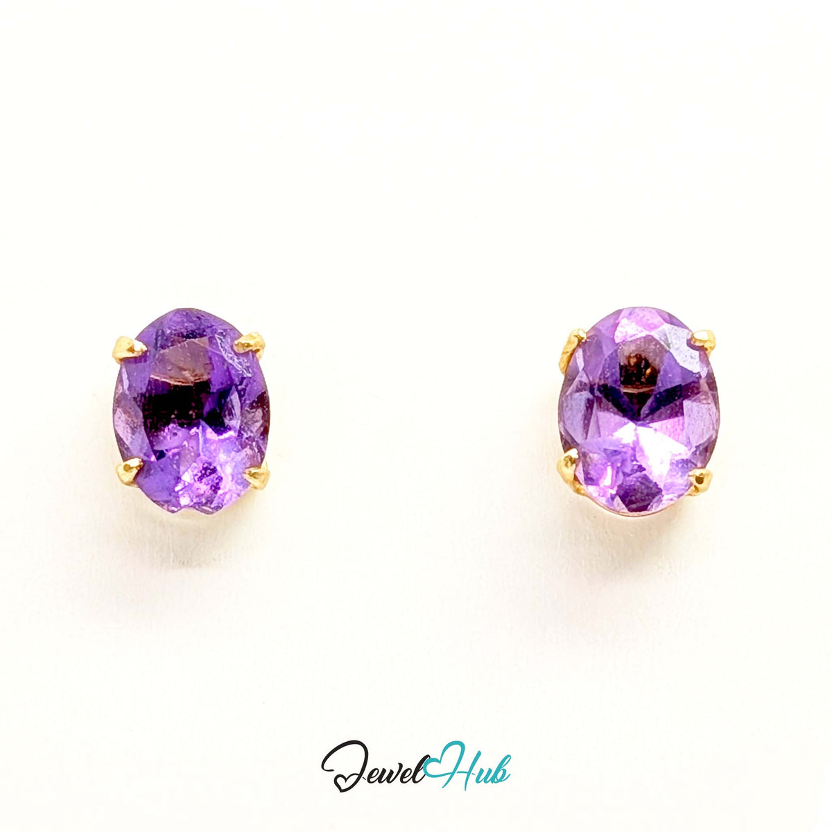Minimal mount putting as little gold as possible between eye and stone - JewelHub