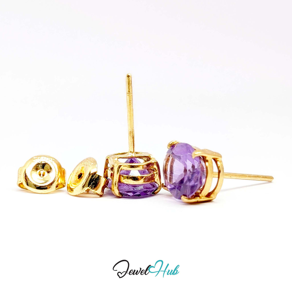 Amethyst catching light across its faceted oval crown - JewelHub