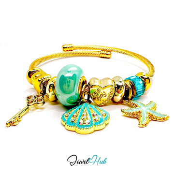 Gold bracelet with turquoise charms on a white background, featuring the brand 'Jewel Hub'.