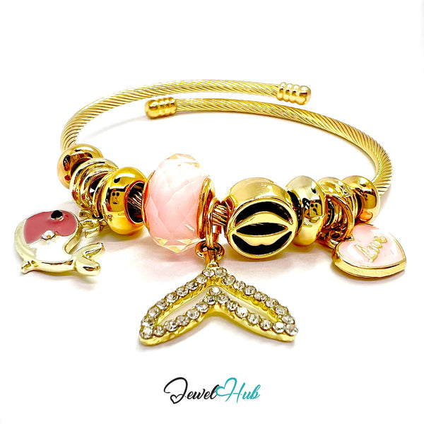 Gold bracelet with various charms on a white background, branded 'Jewel Hub'.