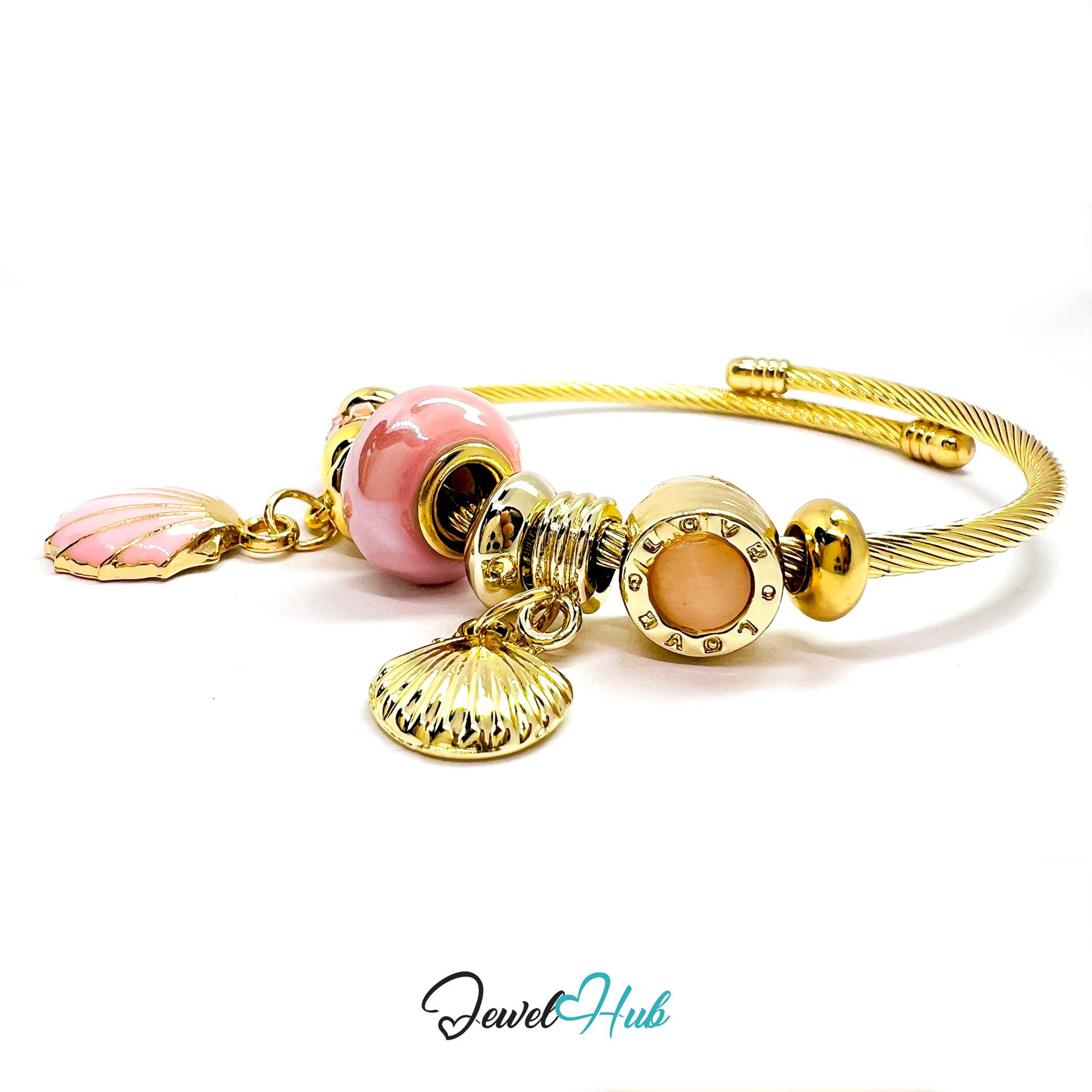 Gold bracelet with pink and beige beads on a white background, branded 'Jewel Hub'.