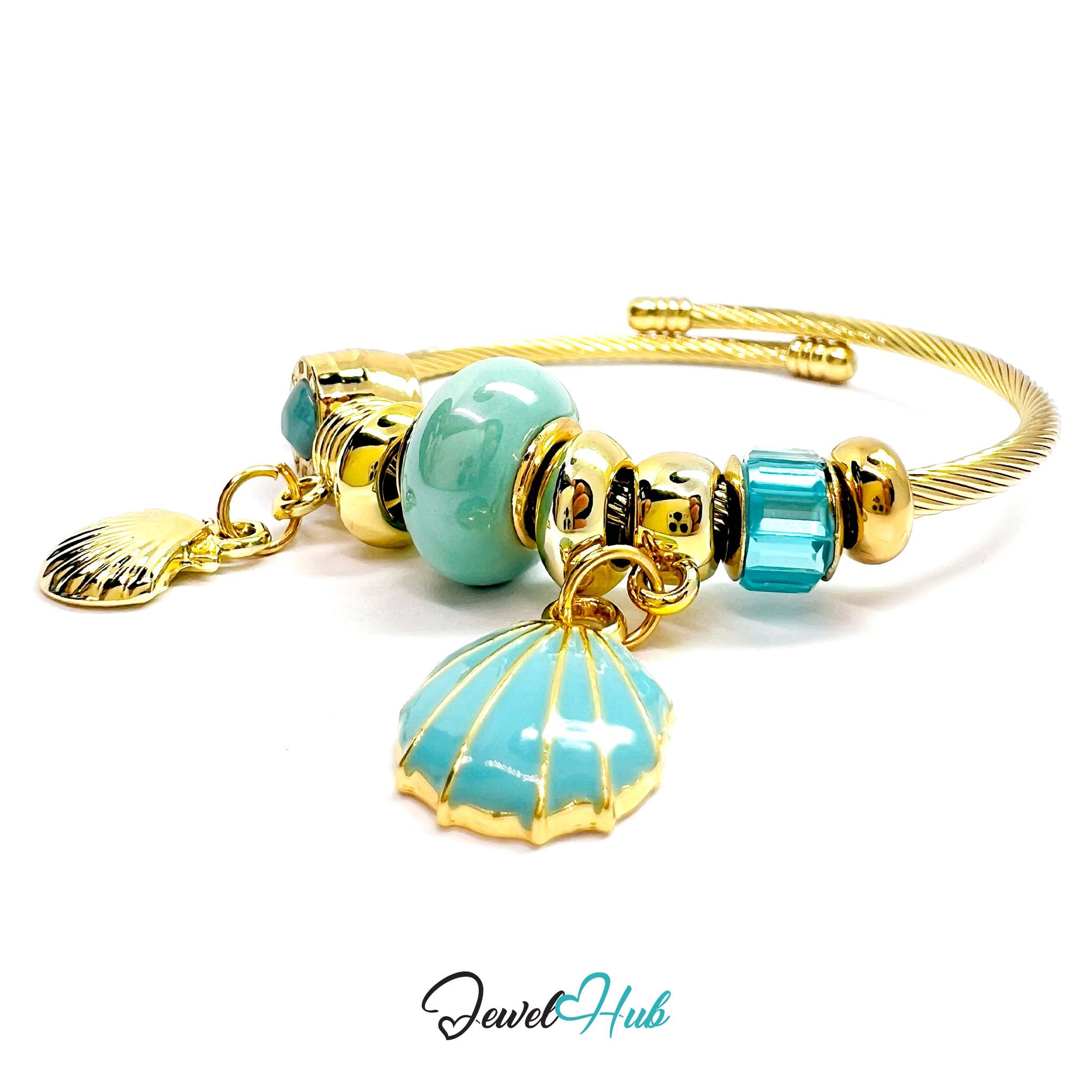 Gold and turquoise bracelet with shell charm on a white background, branded 'Jewel Hub'.