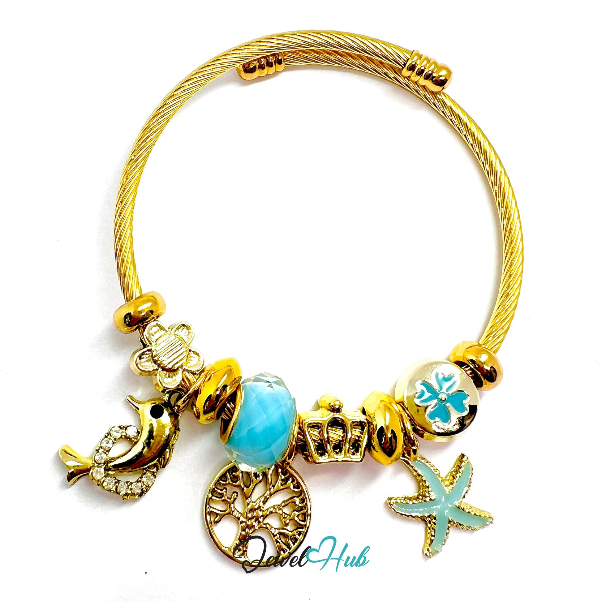 Gold bracelet with blue and gold charms on a white background