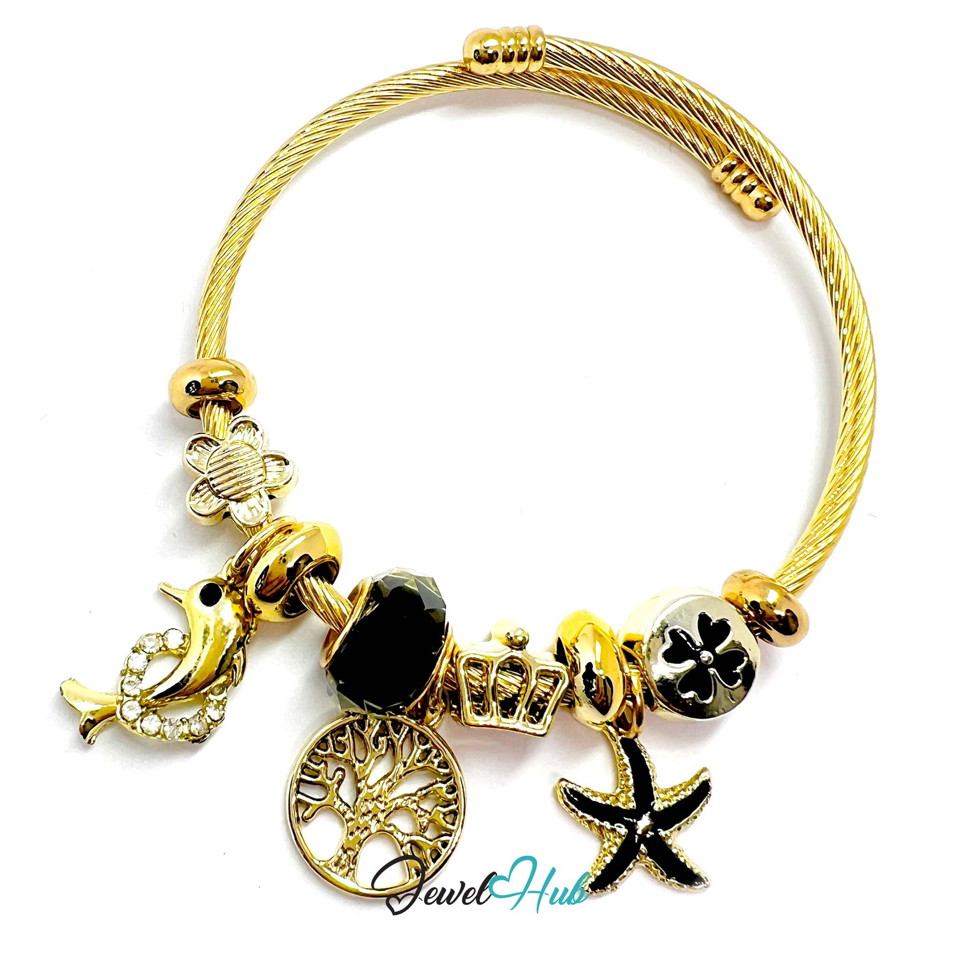 Gold bracelet with various charms on a white background