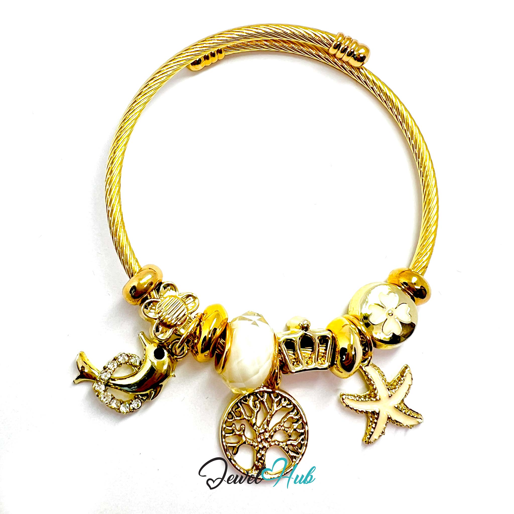 Gold bracelet with various charms on a white background