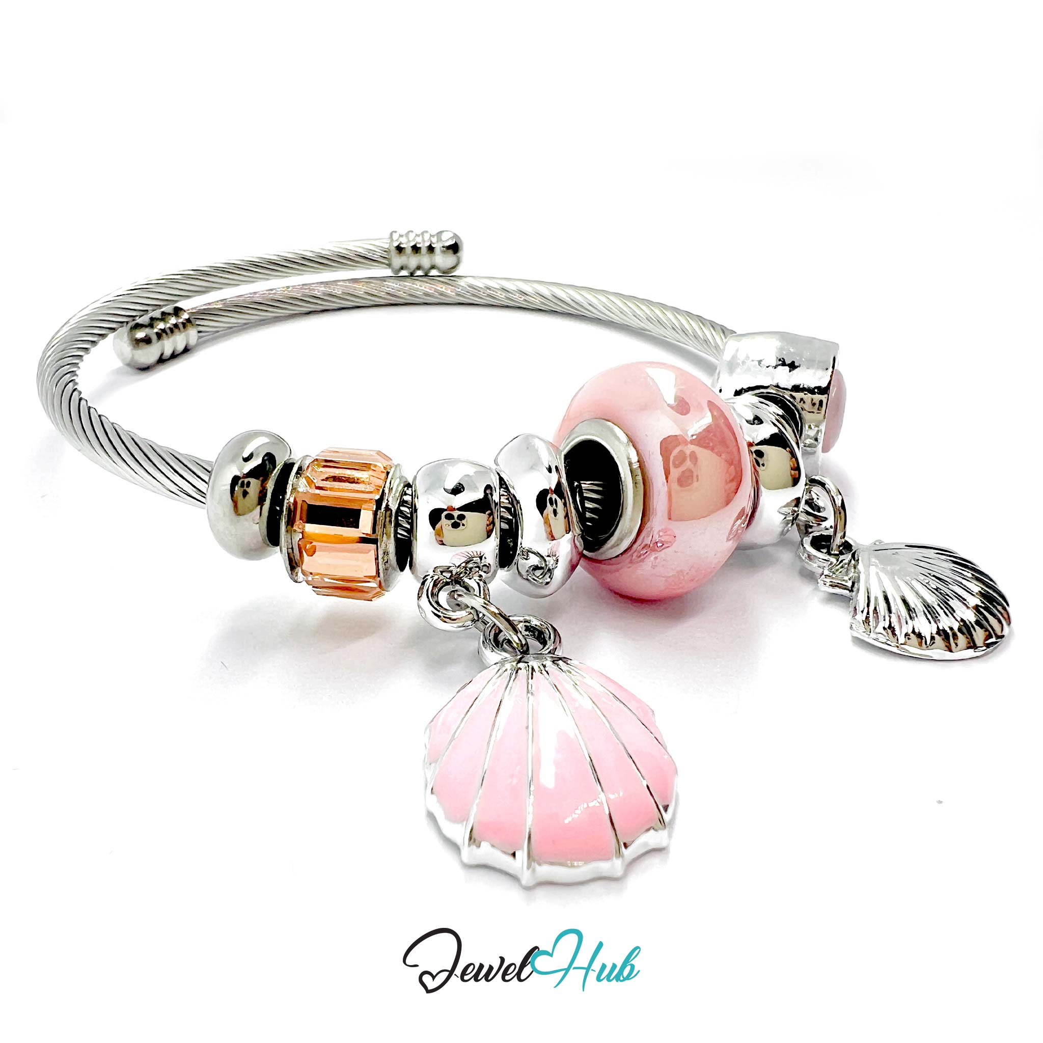 Silver bracelet with pink and clear bead charms on a white background