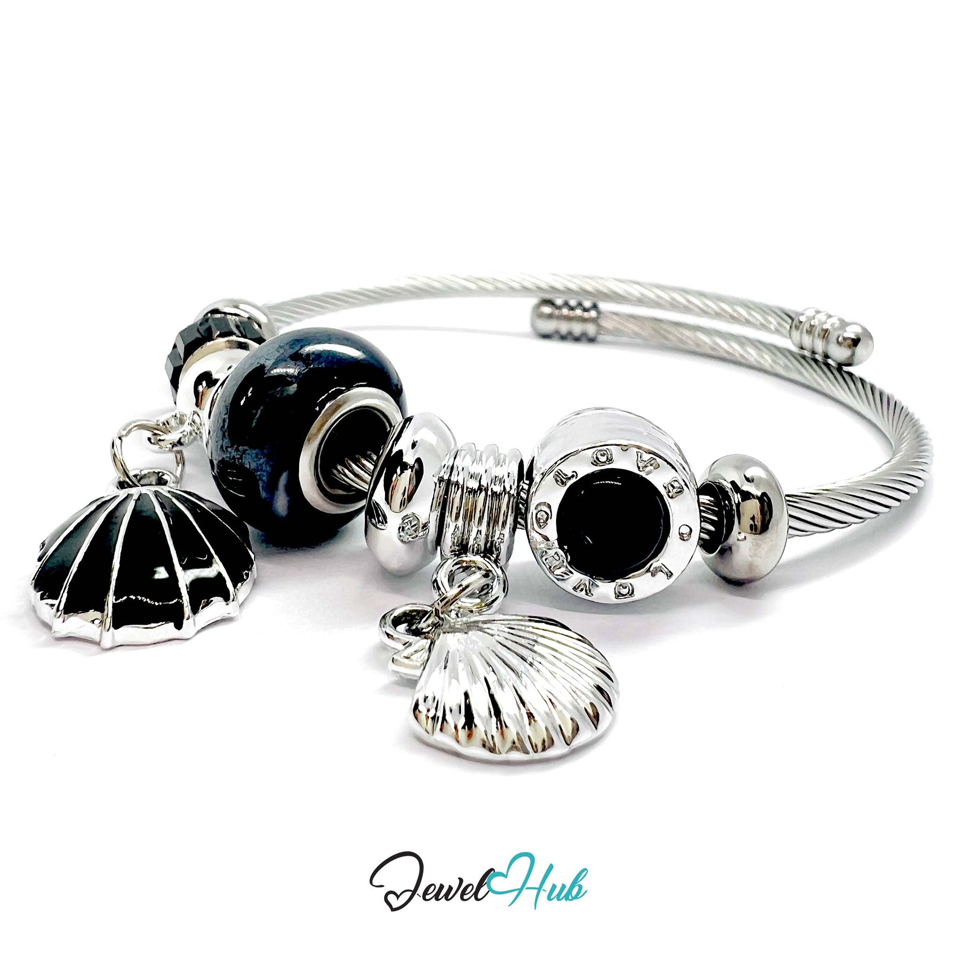 Silver bracelet with black and silver charms on a white background, branded 'Jewel Hub'.