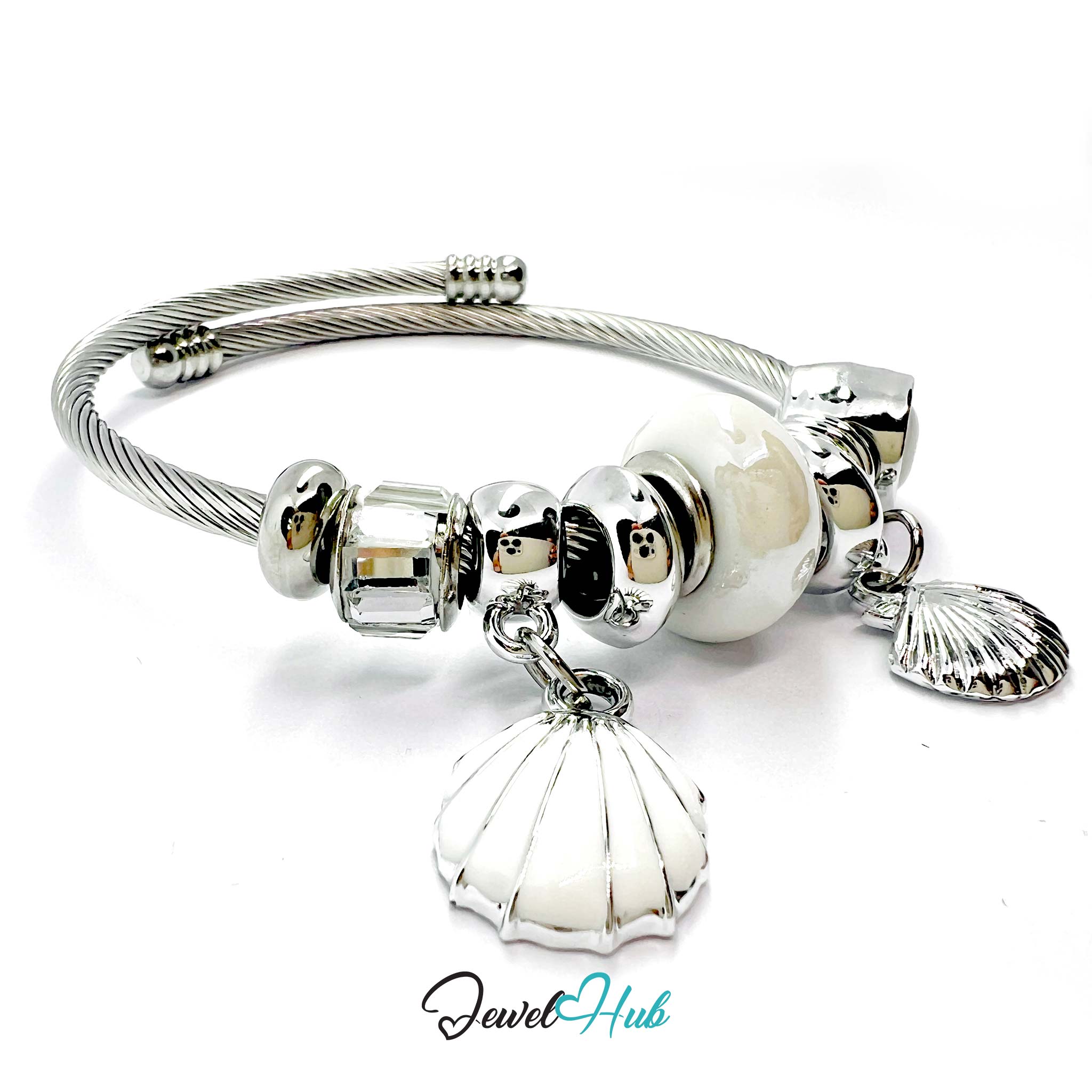 Silver bracelet with shell and bead charms on a white background, branded 'Jewel Hub'.