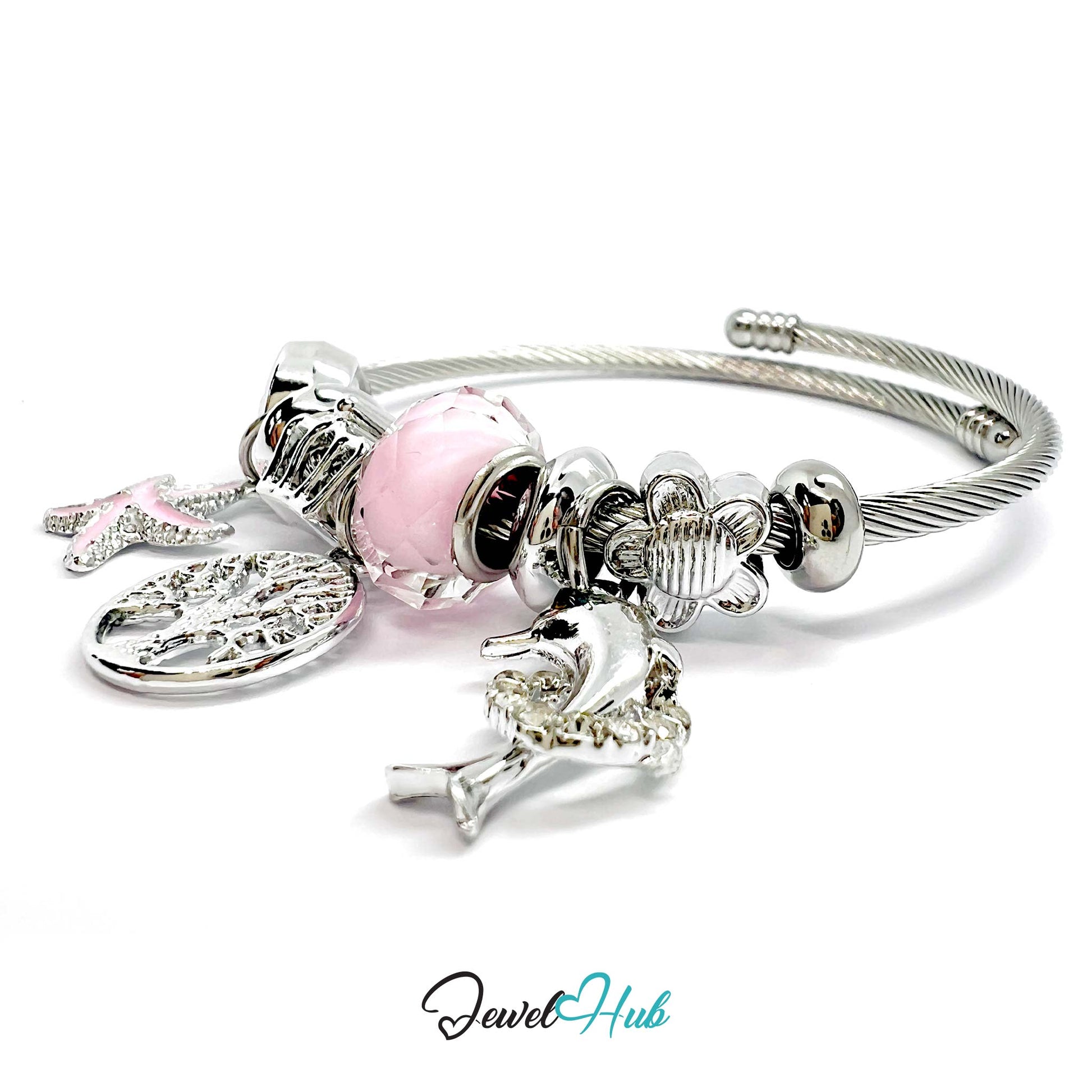 Silver bracelet with pink bead and charms on a white background, branded 'Jewel Hub'.