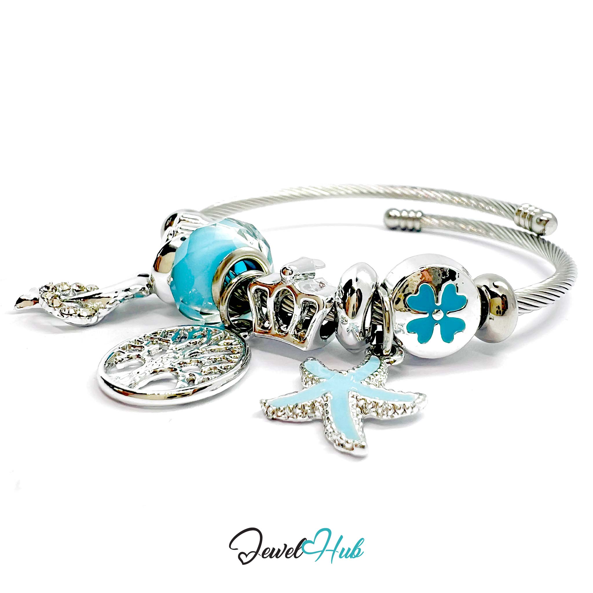 Silver bracelet with blue and clear charm beads on a white background, branded 'Jewel Hub'.