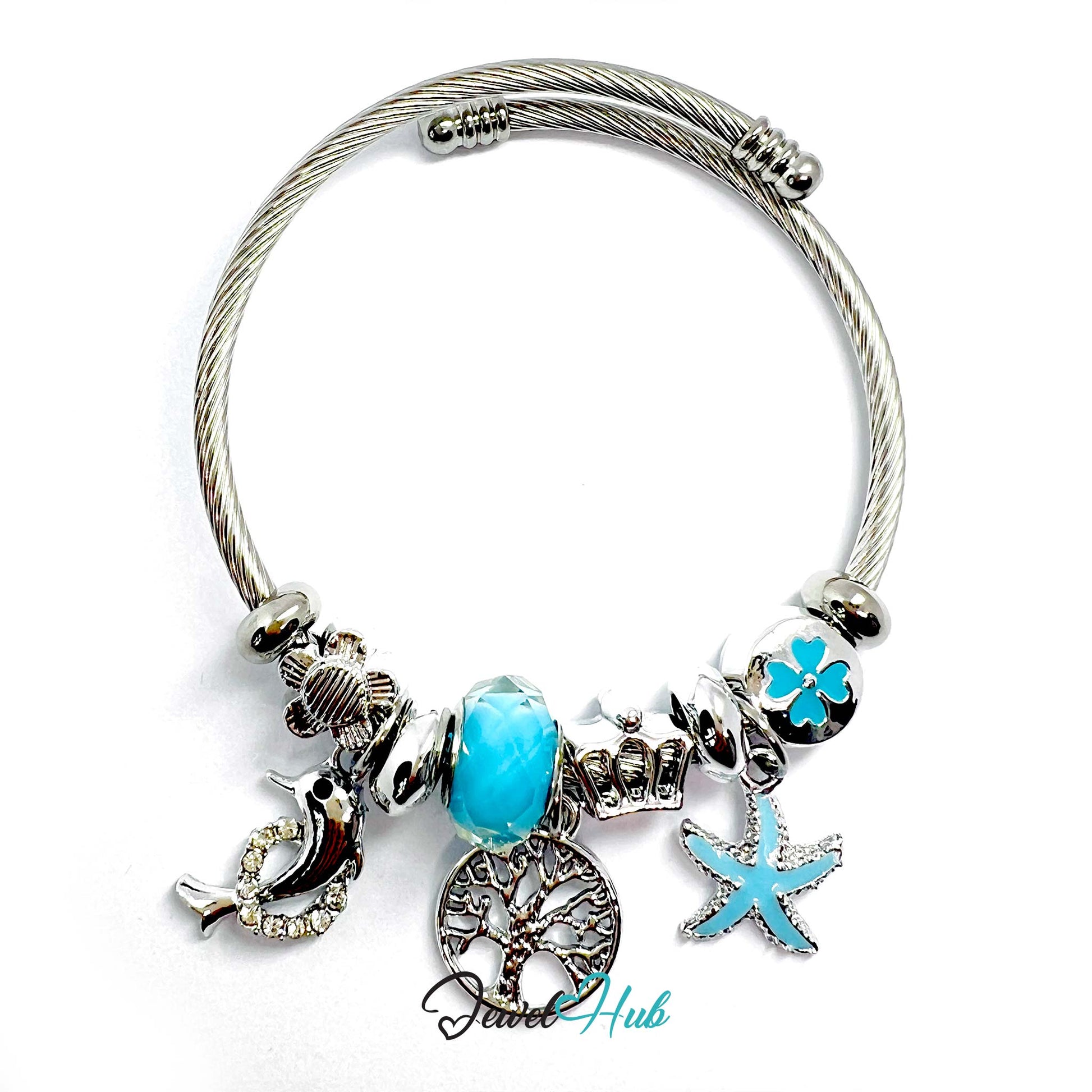 Silver bracelet with turquoise charms on a white background