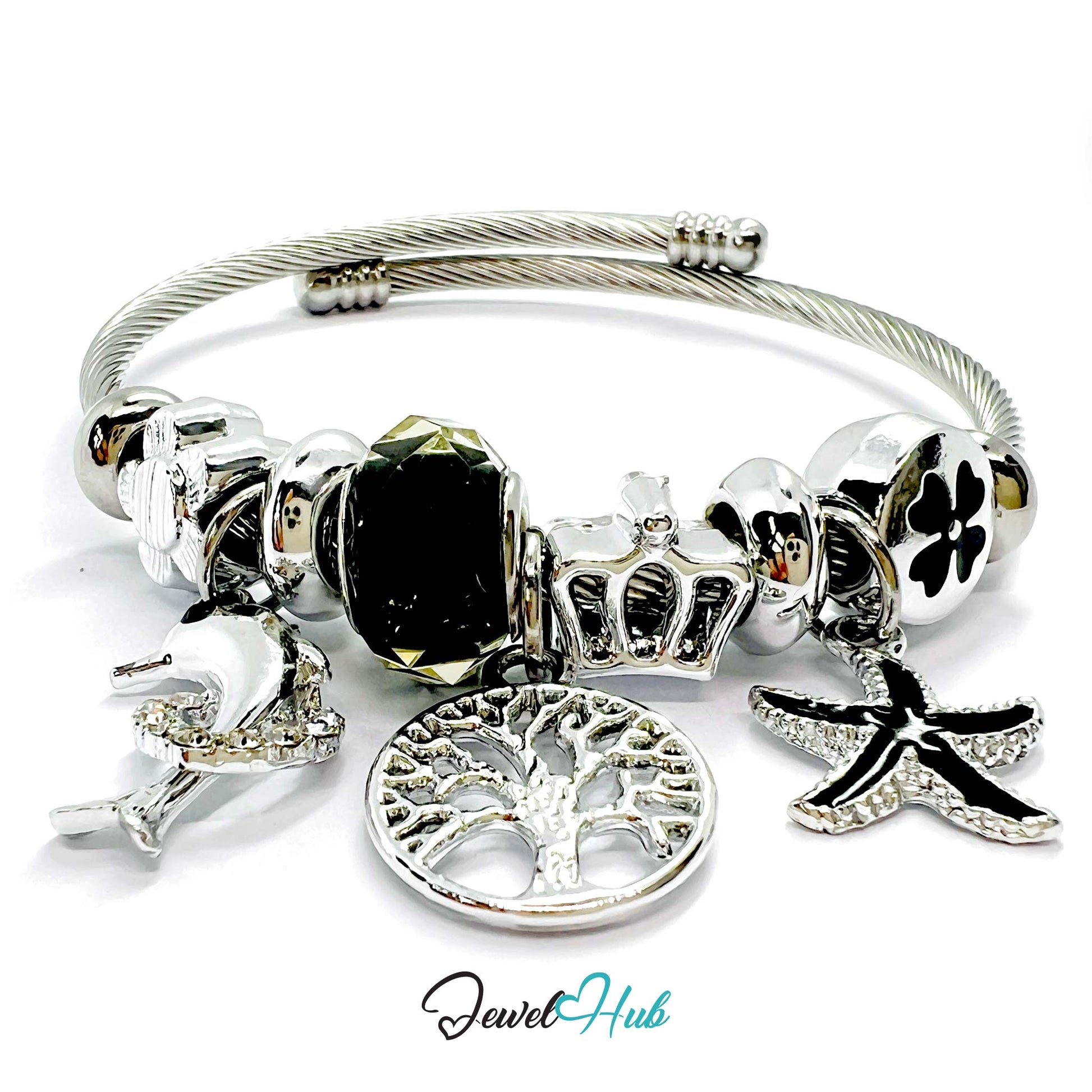 Silver bracelet with various charms on a white background, branded 'Jewel Hub'.