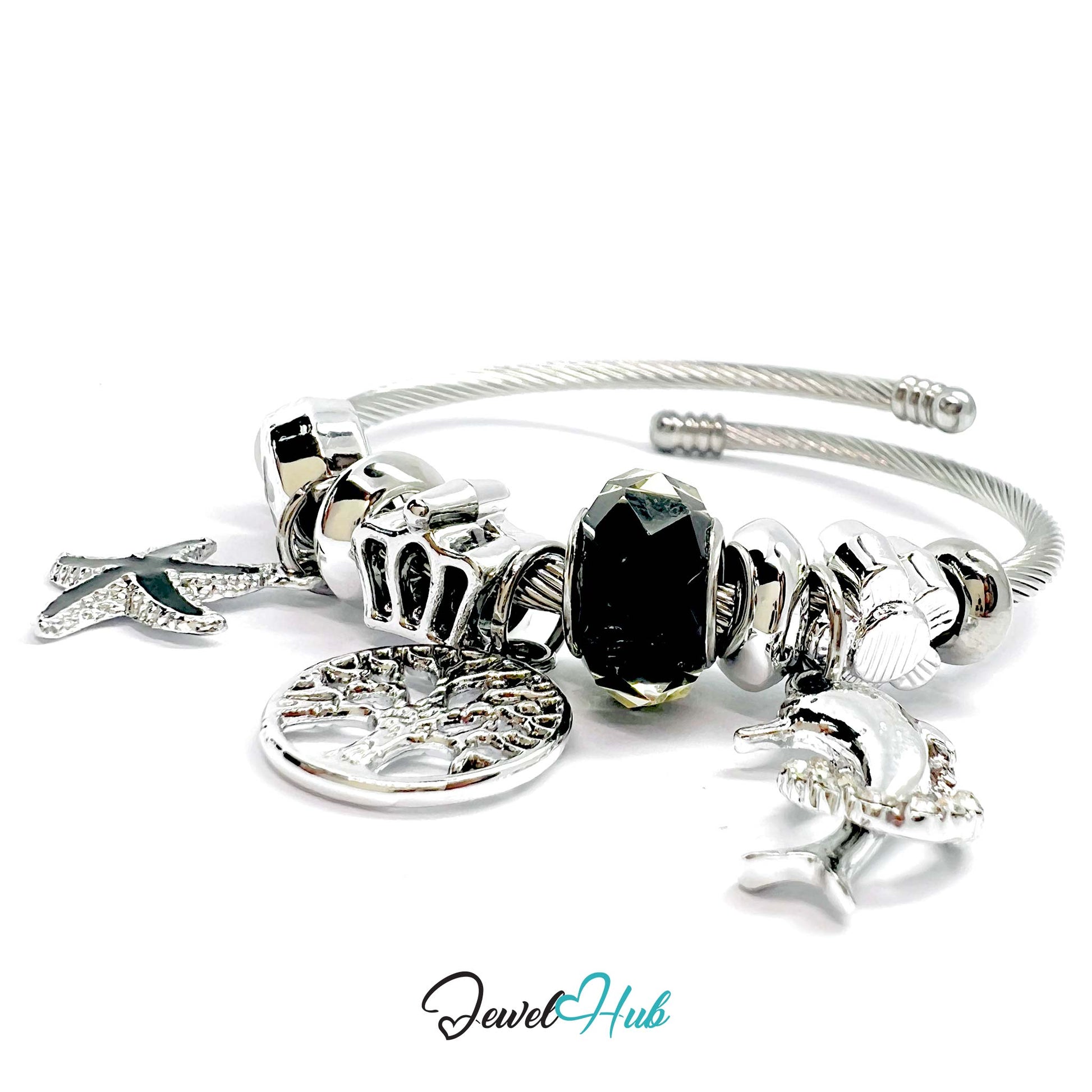 Silver bracelet with various charms on a white background, branded 'Jewel Hub'.