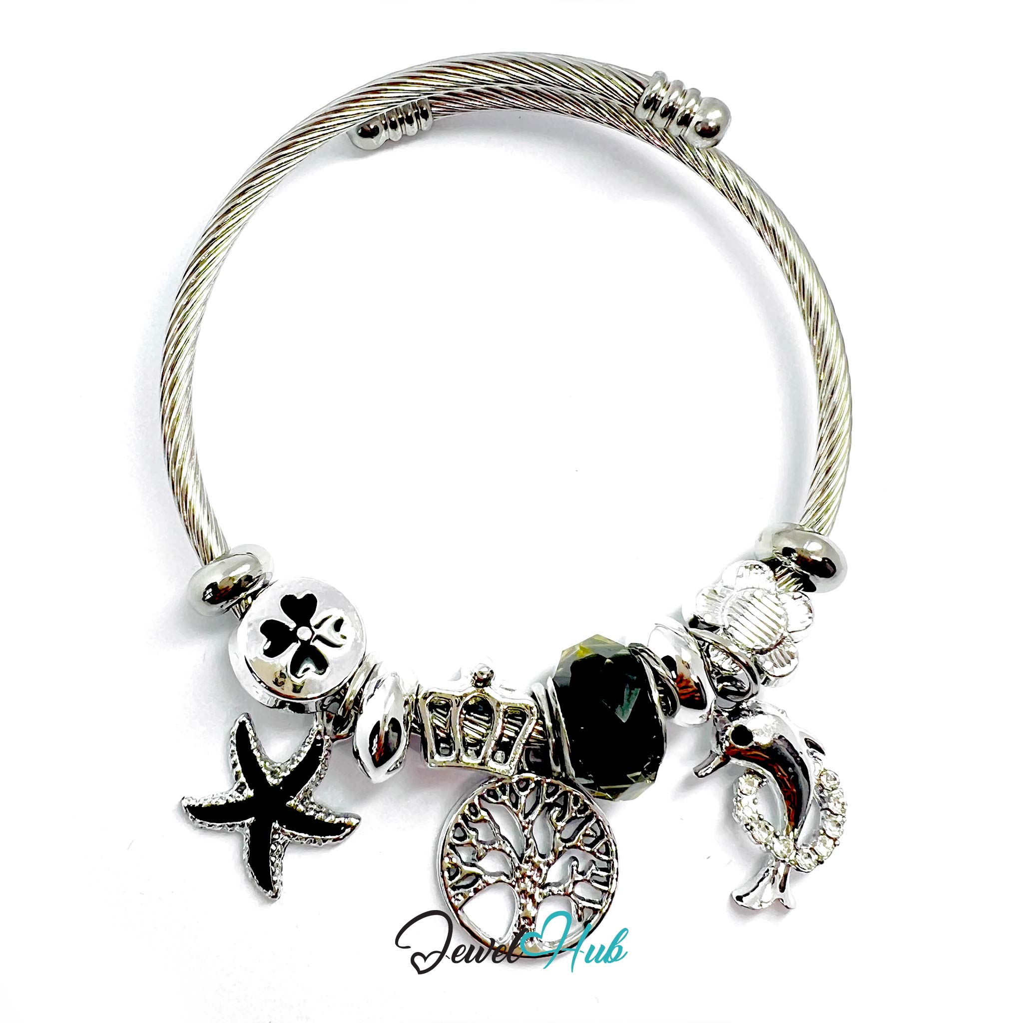 Silver bracelet with various charms on a white background