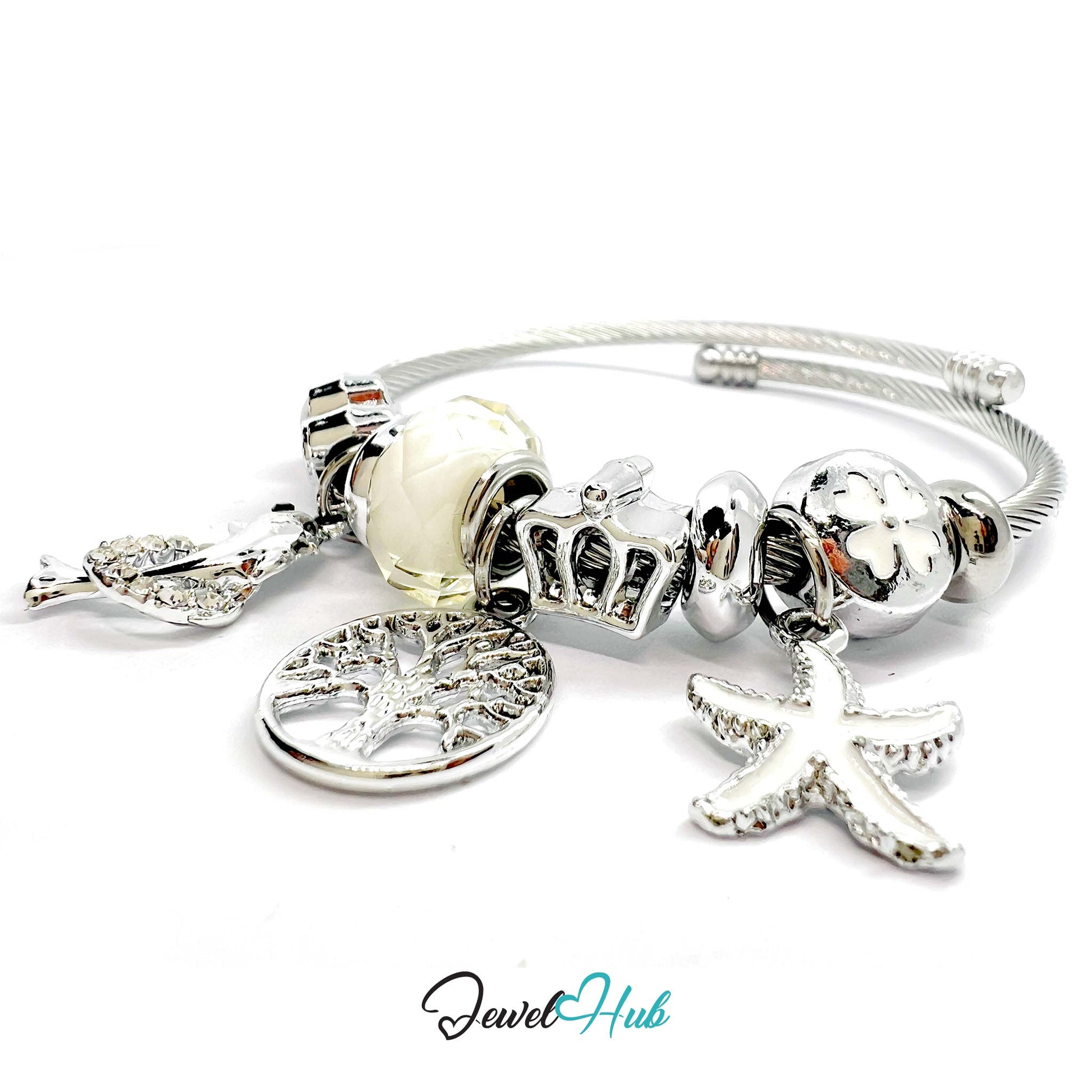 Silver bracelet with various charms on a white background, branded 'Jewel Hub'.