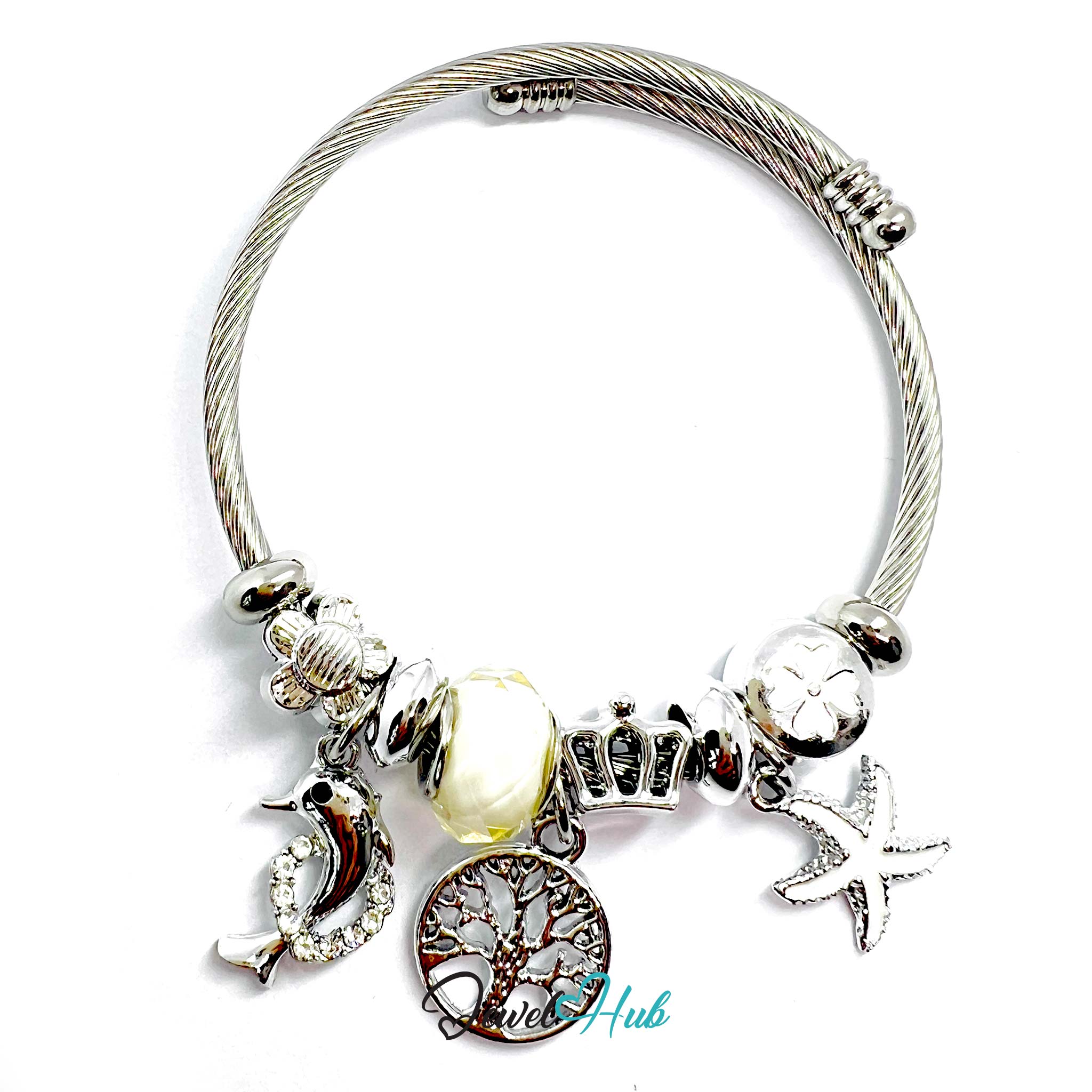 Silver bracelet with various charms on a white background