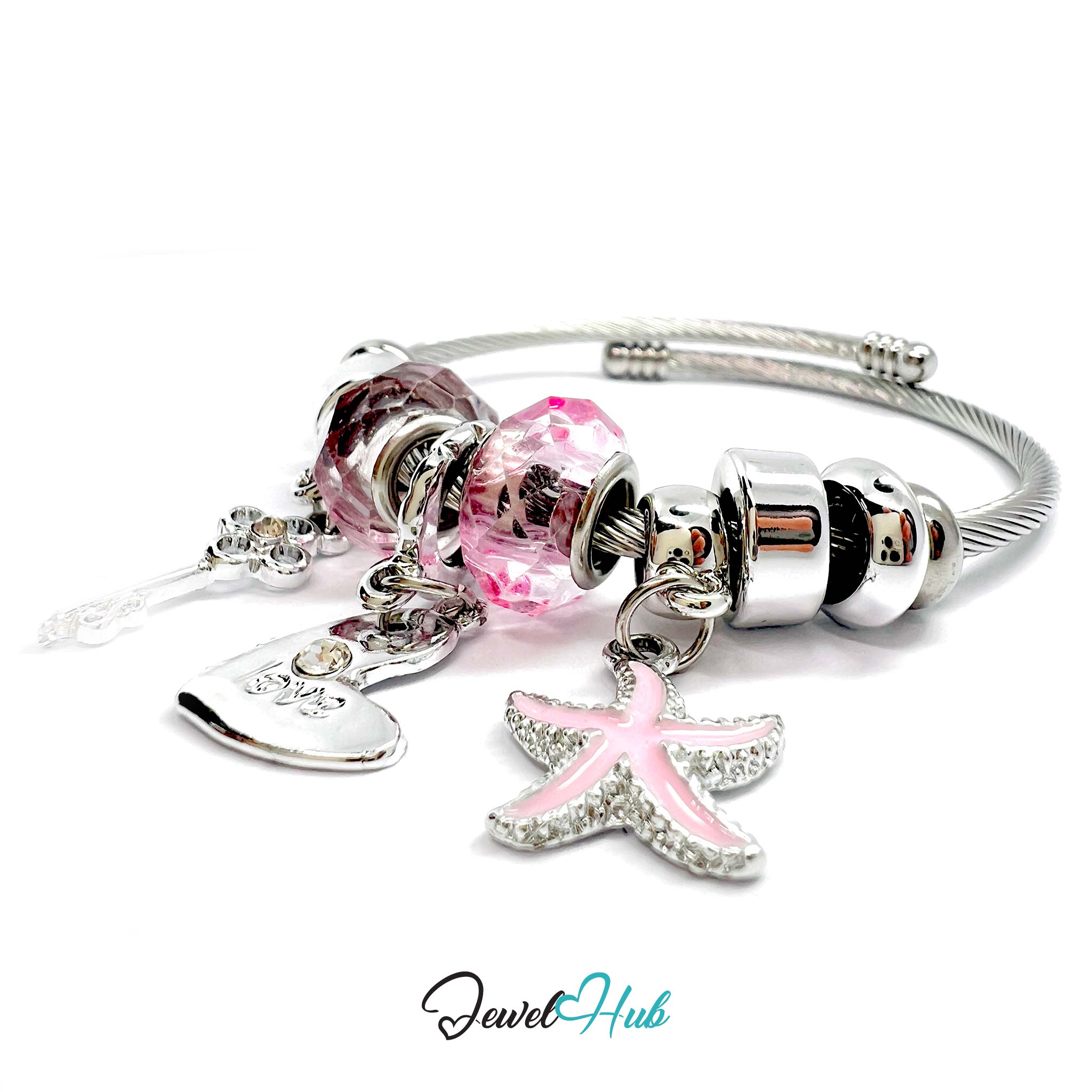 Silver bracelet with pink breast cancer awareness charm and other beads on a white background, branded 'Jewel Hub'.