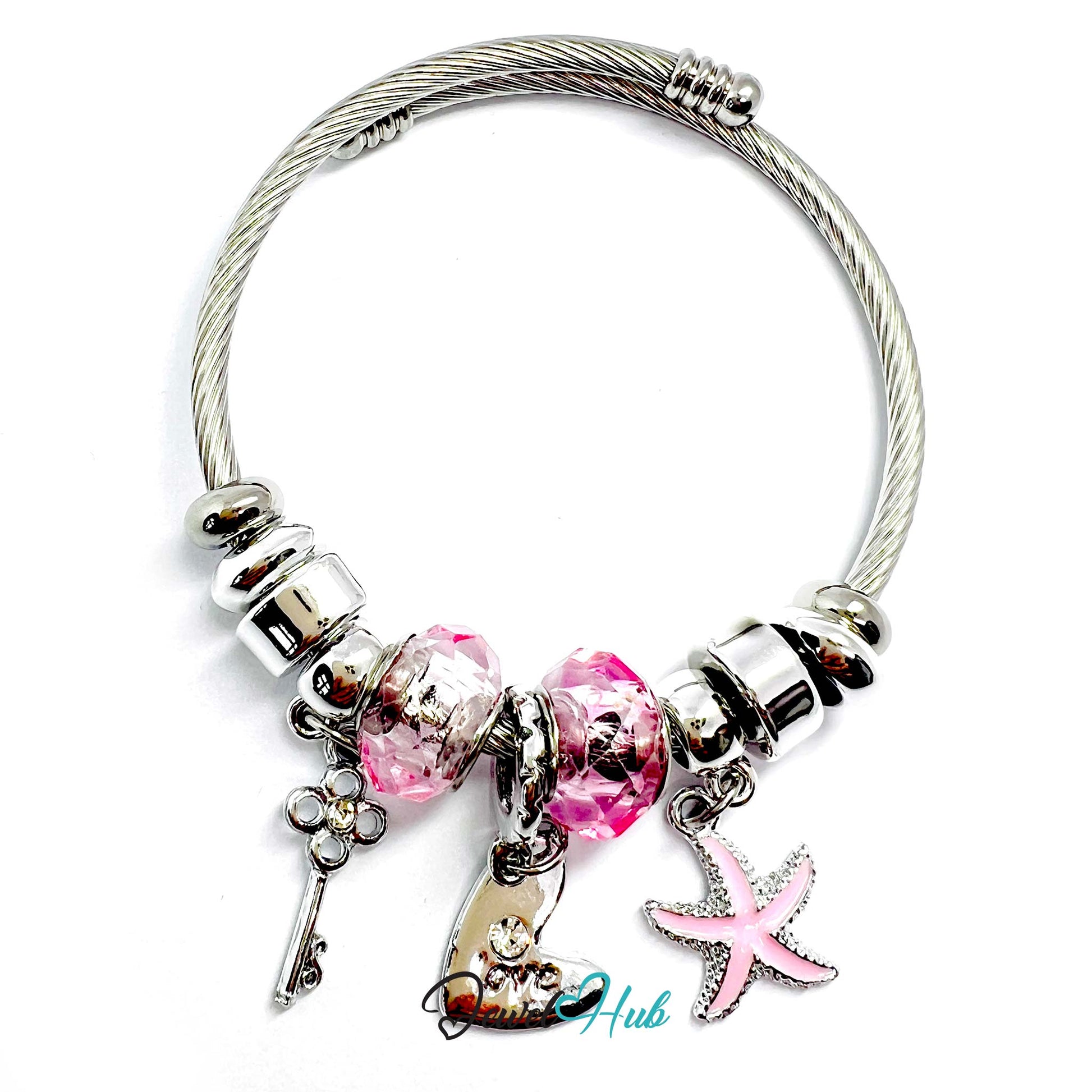 Silver bracelet with pink beads and charms on a white background