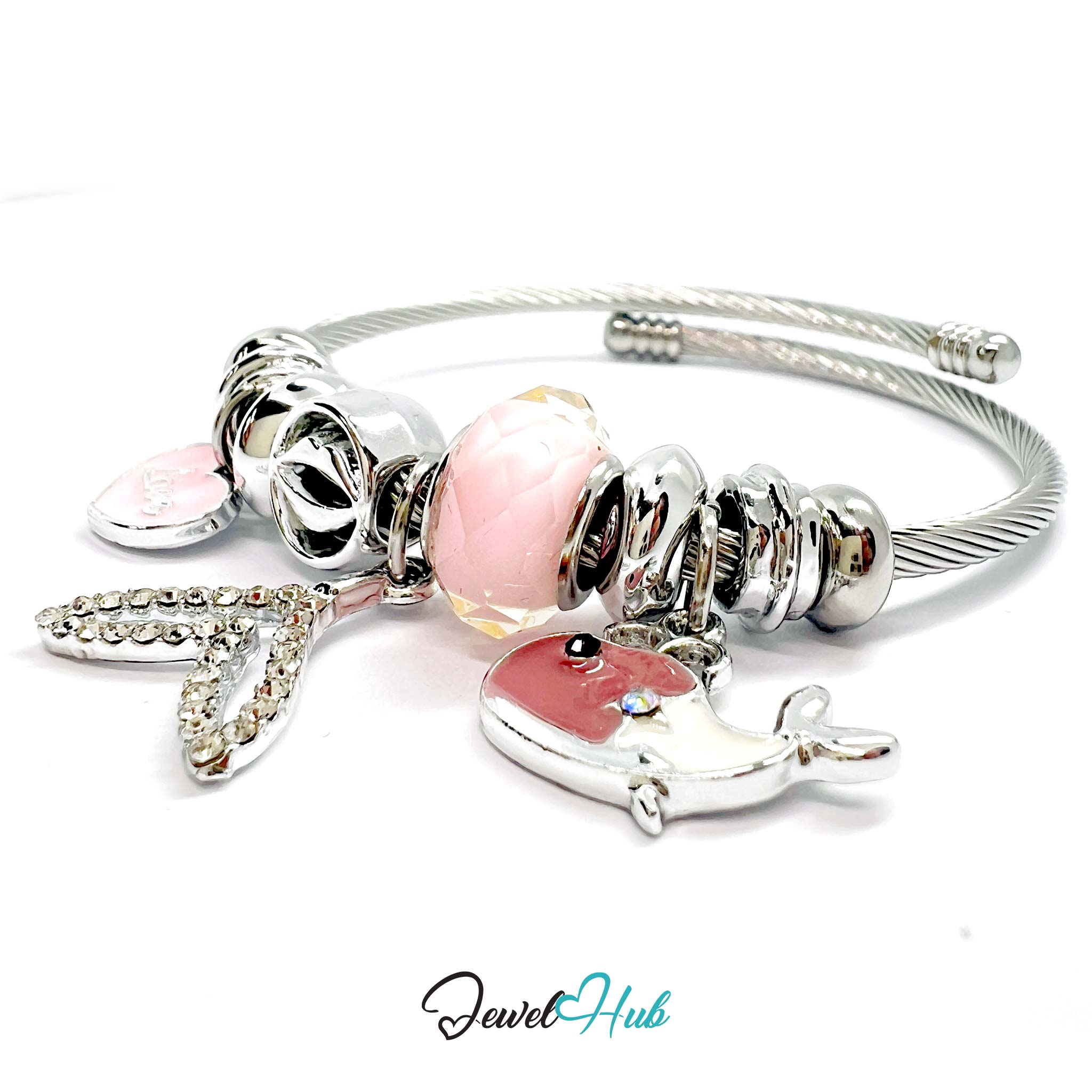 Silver bracelet with pink beads and charms on a white background, branded 'Jewel Hub'.