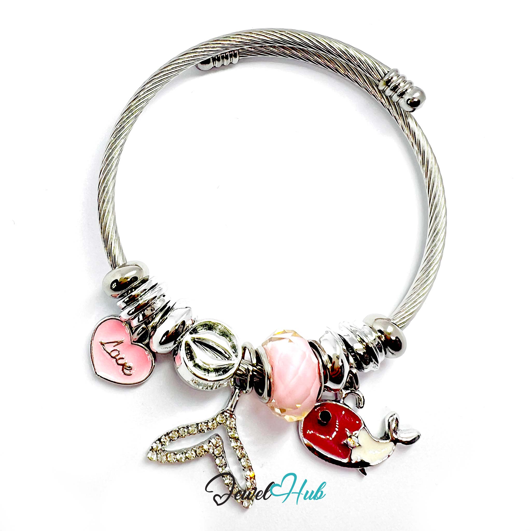 Silver bracelet with pink beads and charms on a white background,