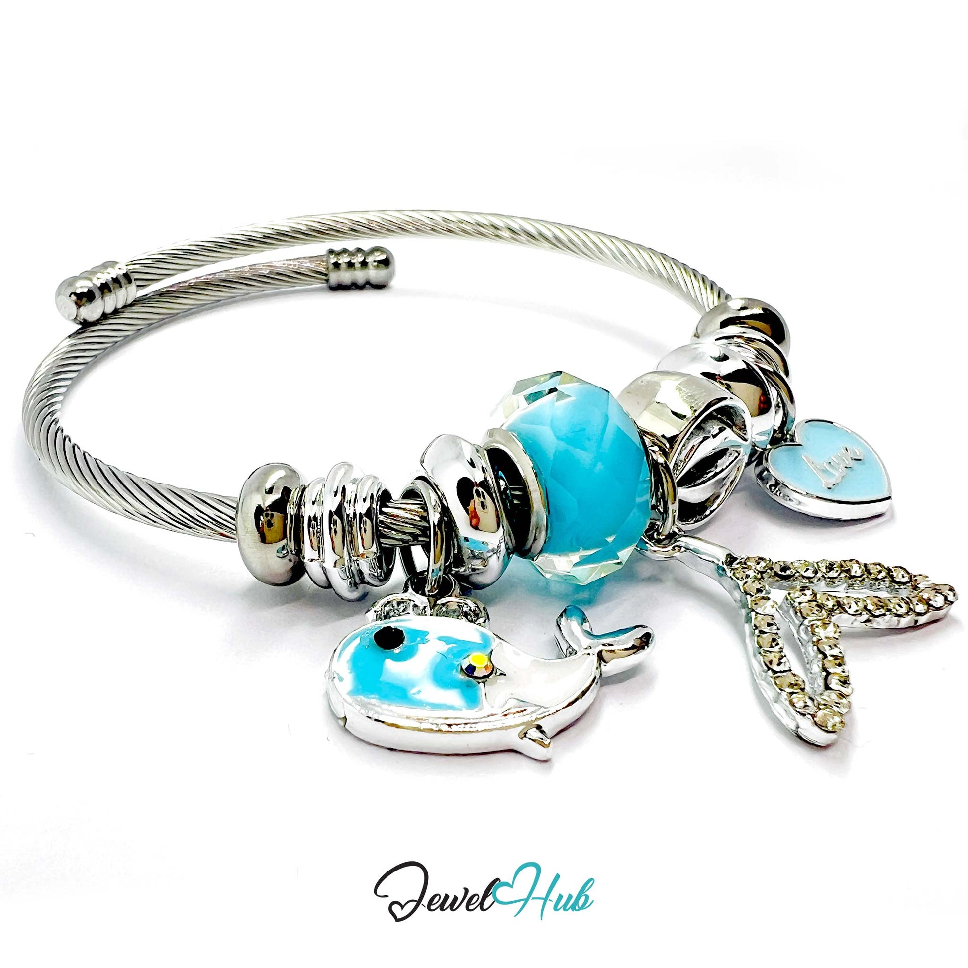 Silver bracelet with cyan beads and charms on a white background,