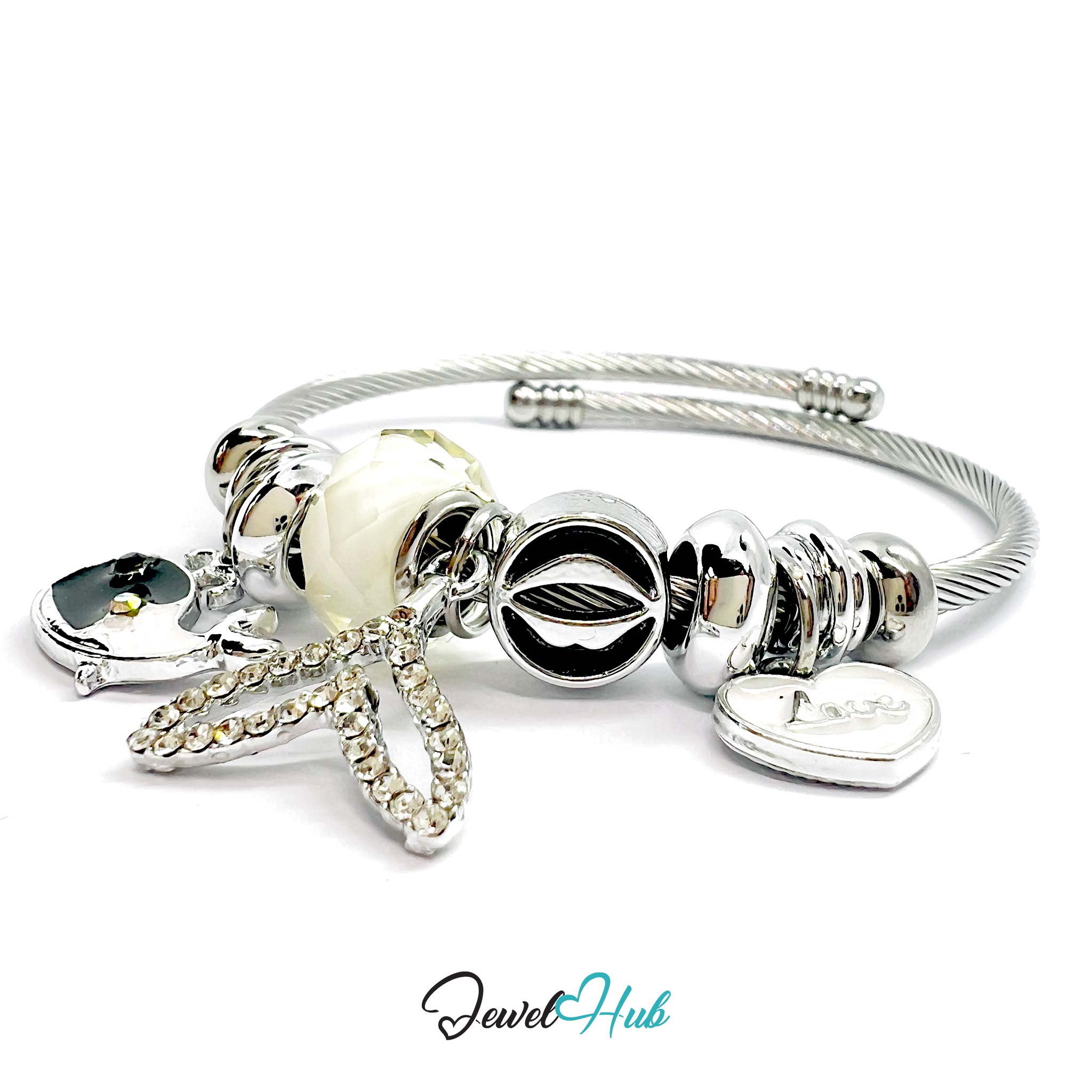 Silver bracelet with various charms on a white background, branded 'Jewel Hub'.