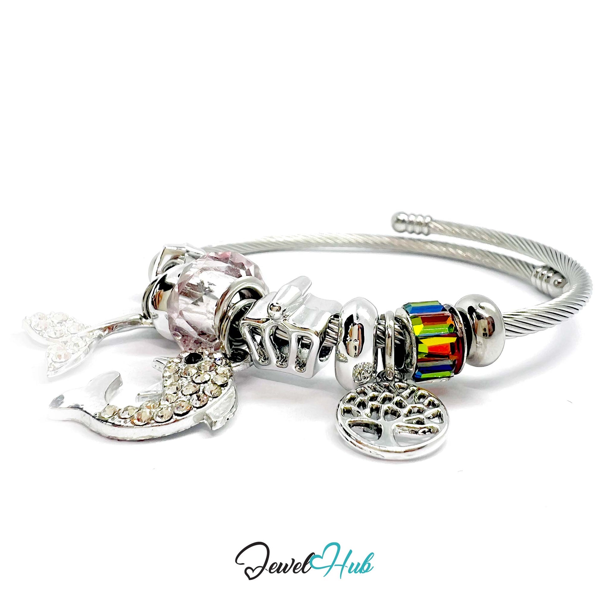 Silver bracelet with various charms on a white background, branded 'Jewel Hub'.
