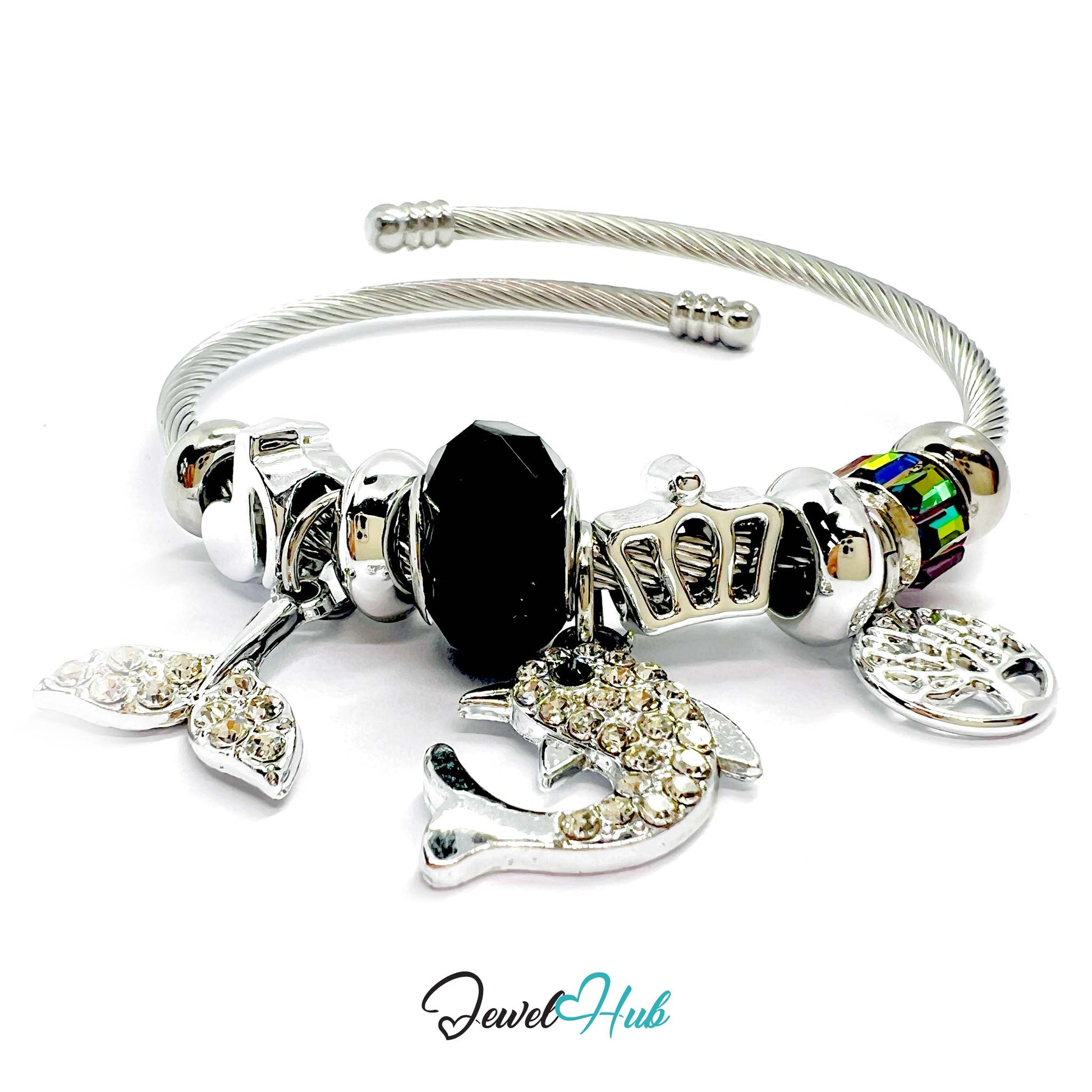 Silver bracelet with various charms on a white background, branded 'Jewel Hub'.