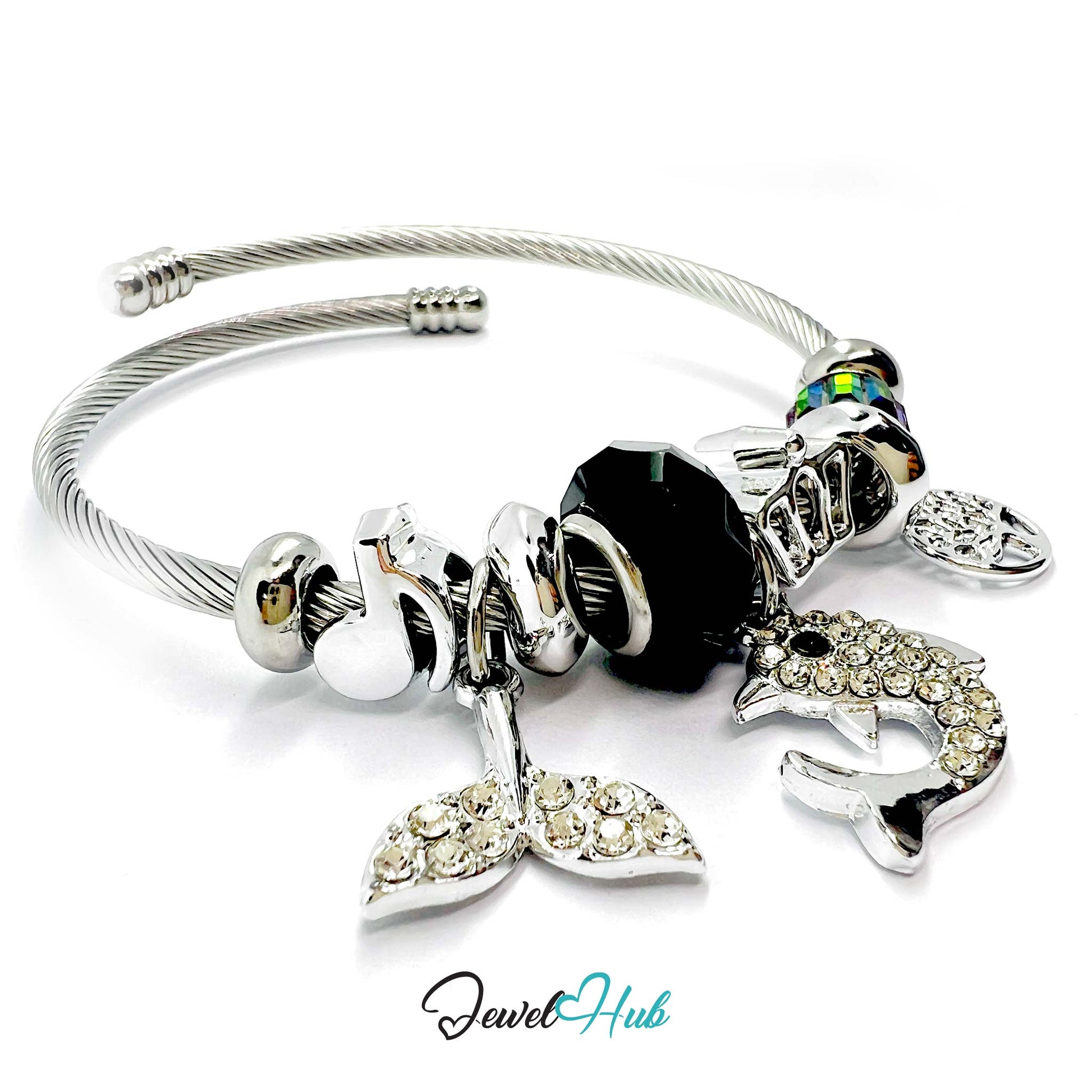 Silver bracelet with mermaid and dolphin charms on a white background, branded 'Jewel Hub'.