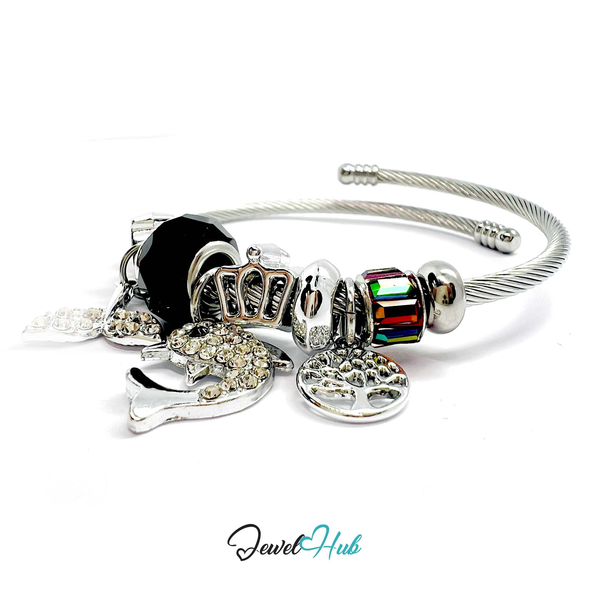 Silver bracelet with various charms on a white background, branded 'Jewel Hub'.