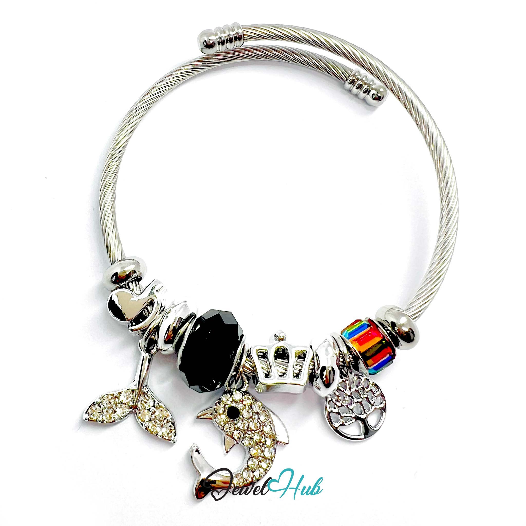 Silver bracelet with various charms on a white background