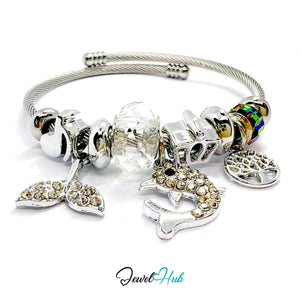 Silver bracelet with various charms on a white background, branded 'Jewel Hub'.