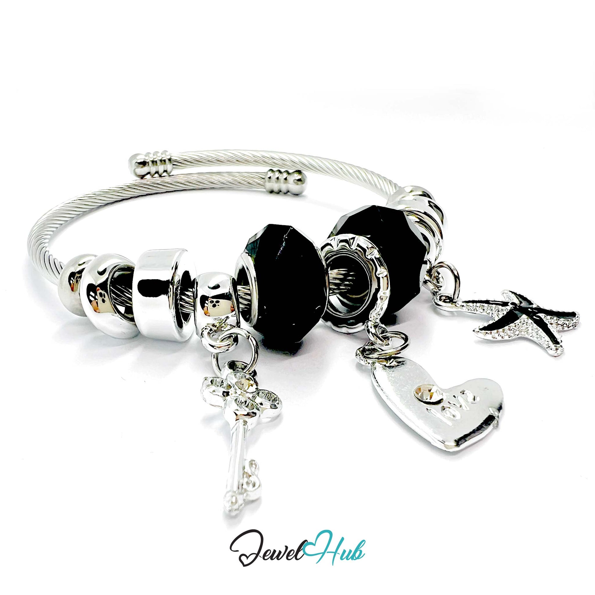 Silver bracelet with black beads and charms on a white background, branded 'Jewel Hub'.