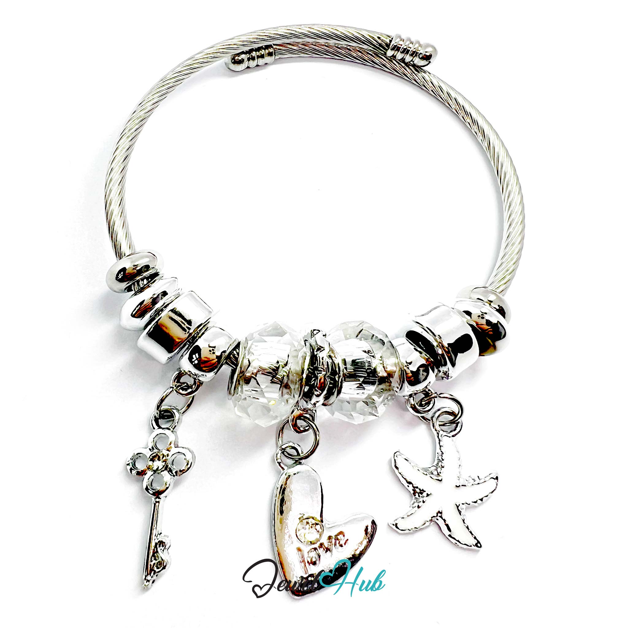Silver bracelet with charms on a white background