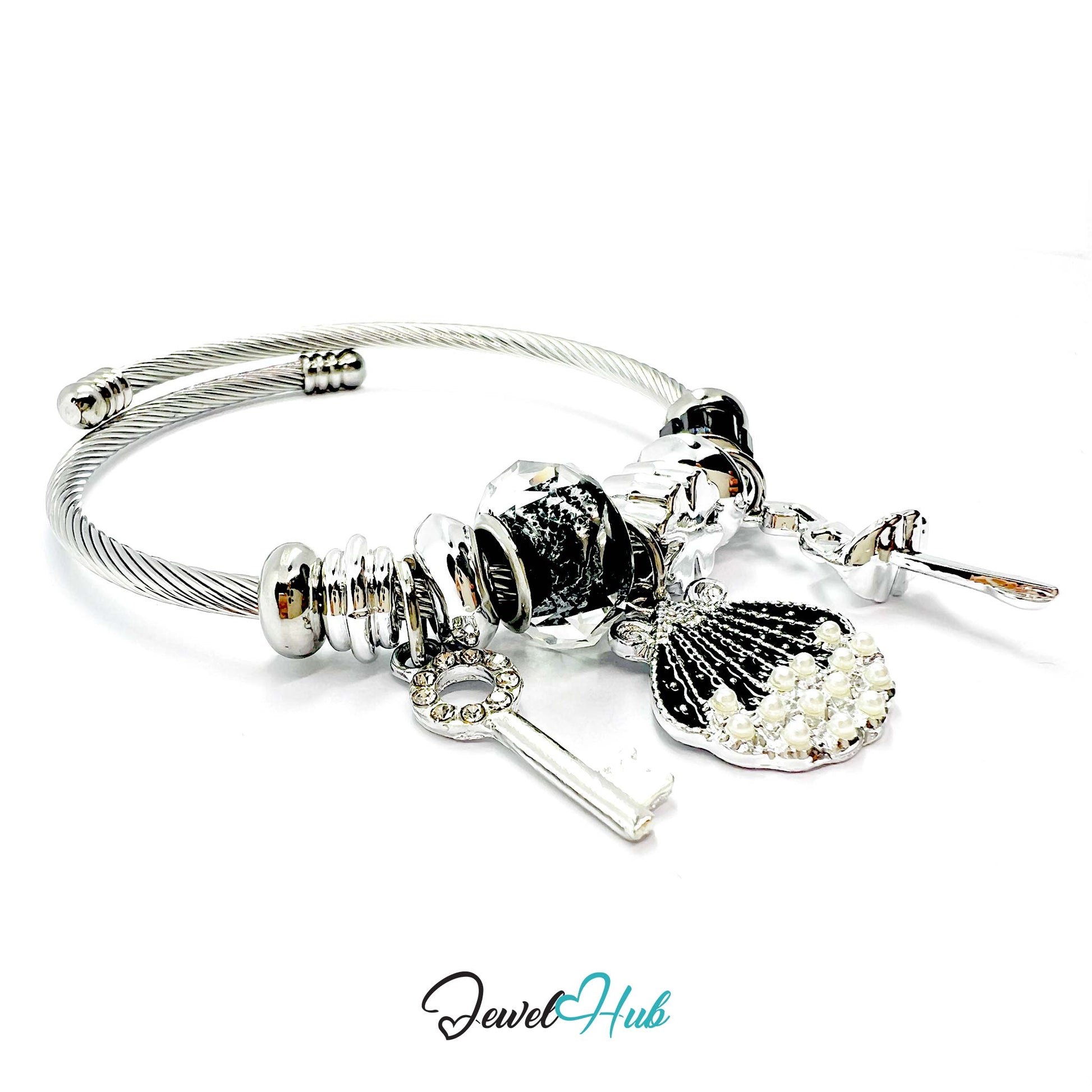 Silver bracelet with charms on a white background, branded 'Jewel Hub'.