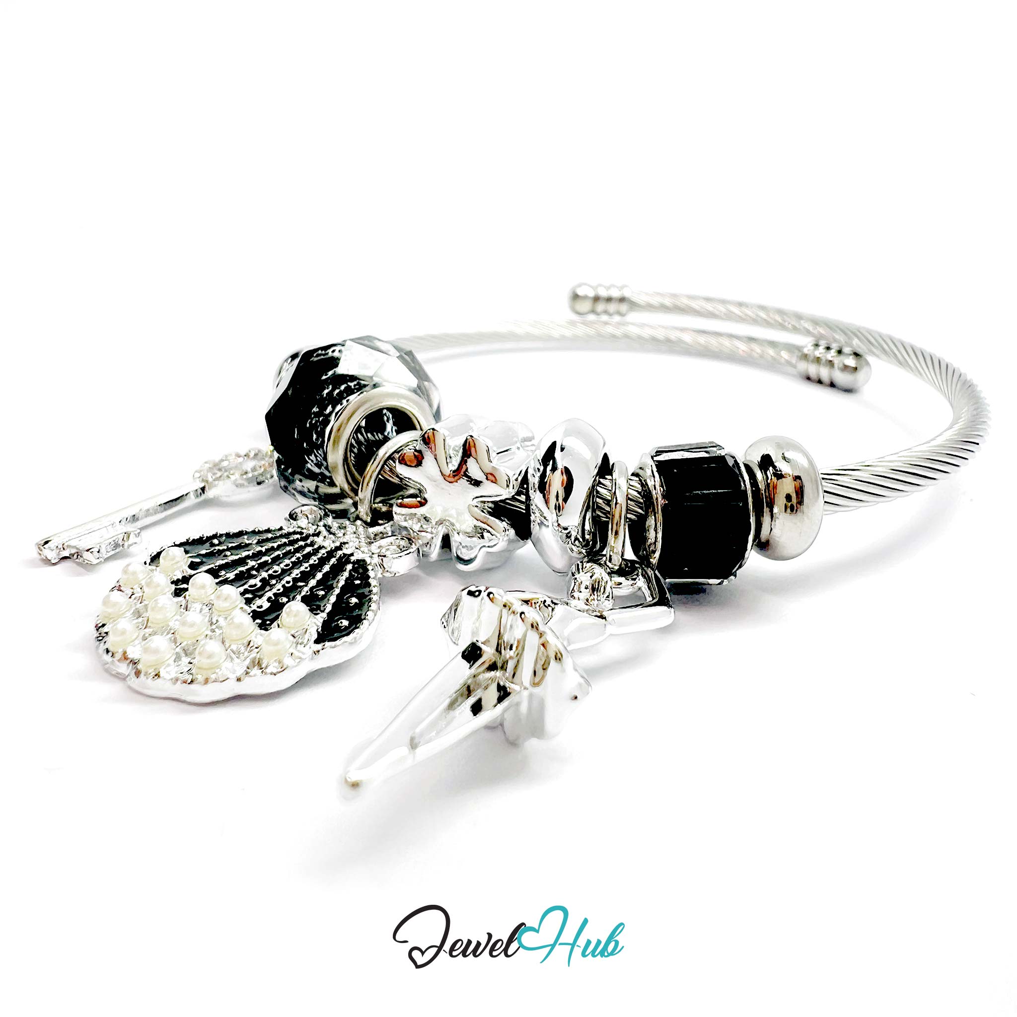 Silver bracelet with black and white beads on a white background, branded 'Jewel Hub'.