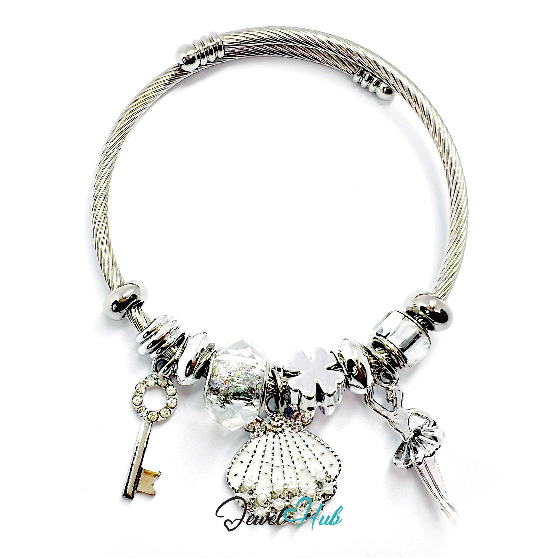 Silver stainless steel charm bracelet with white and clear beads and charms on a white background