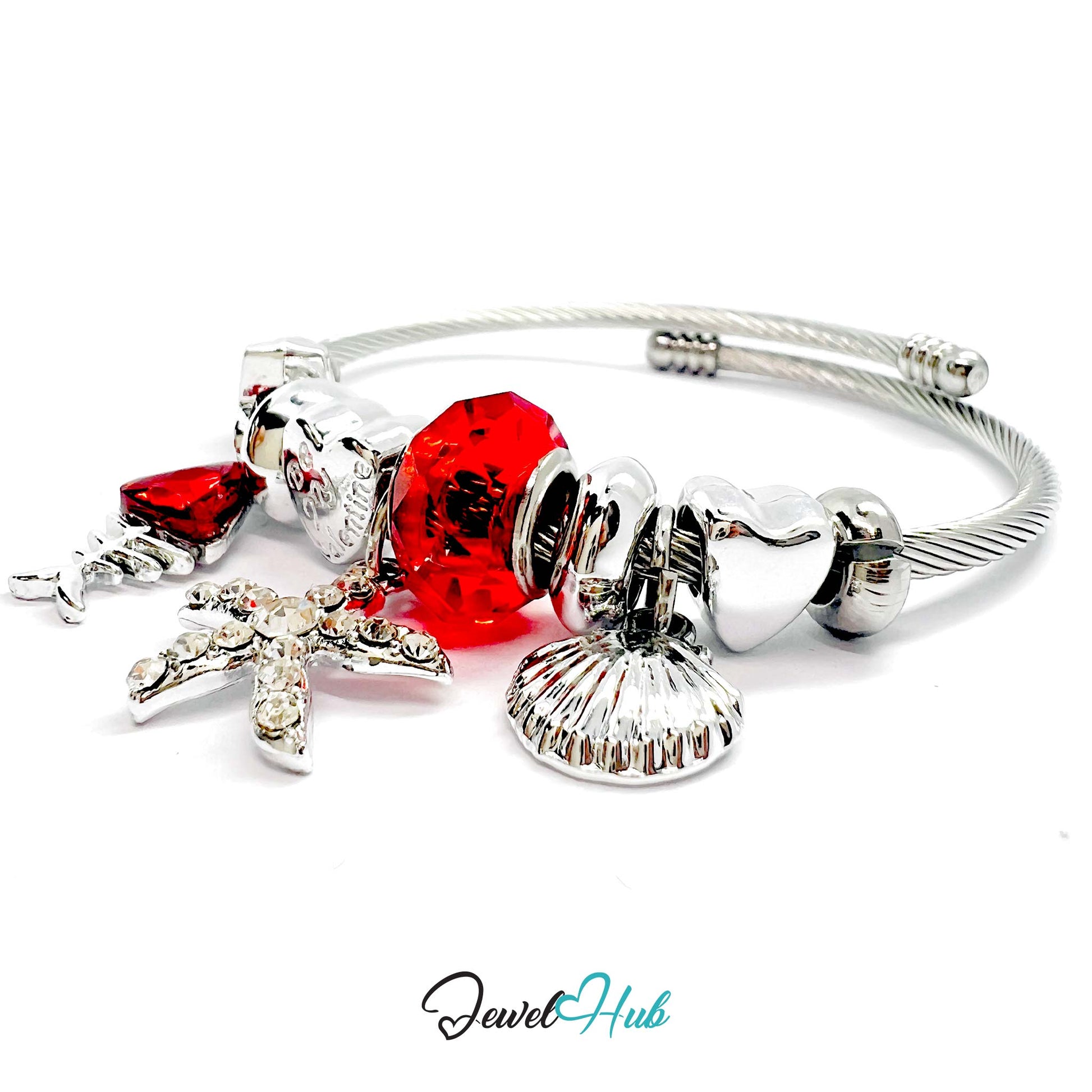 Silver stainless steel bracelet with various red charms on a white background