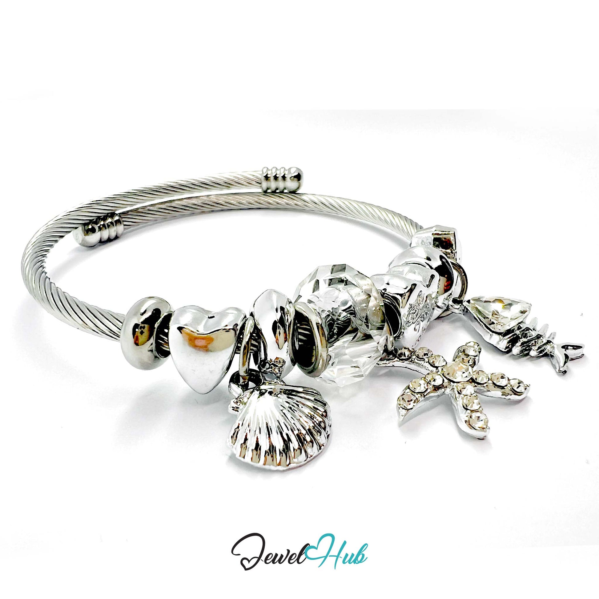 Silver stainless steel bracelet with various red charms on a white background