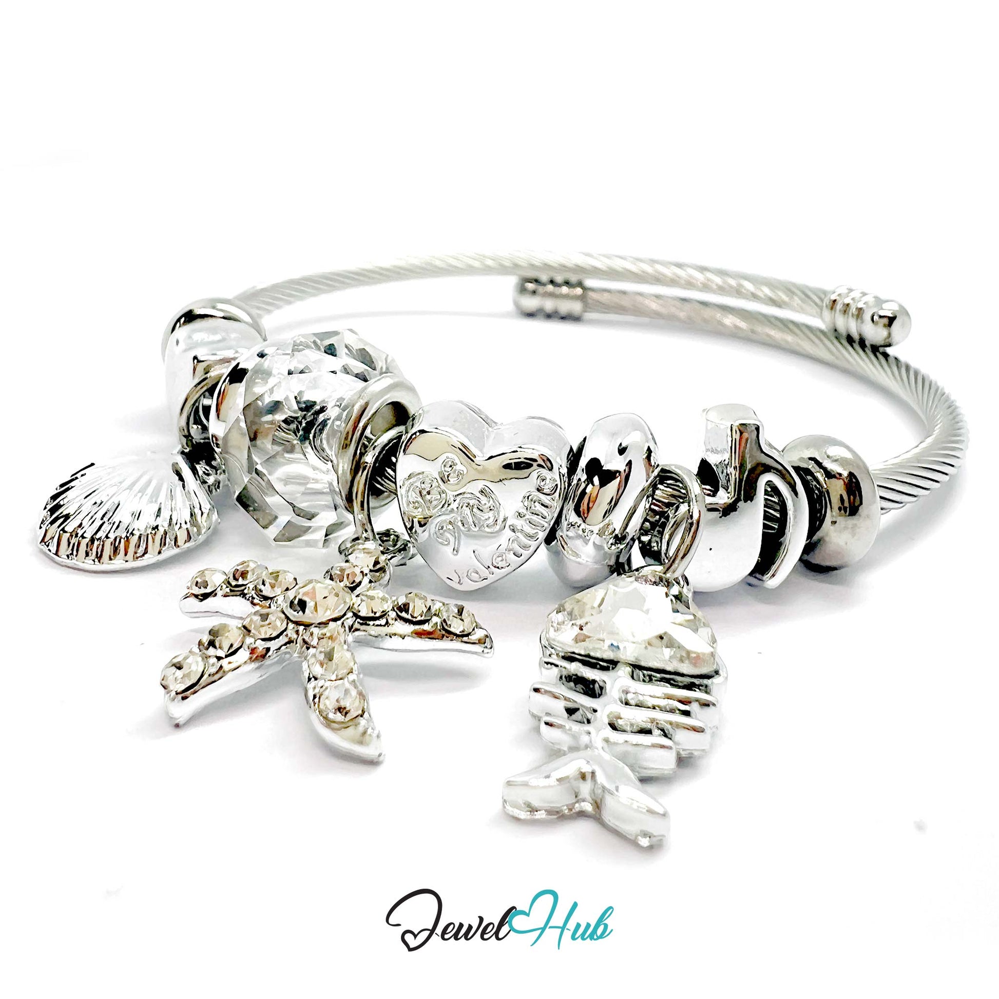 Silver stainless steel bracelet with various charms on a white background