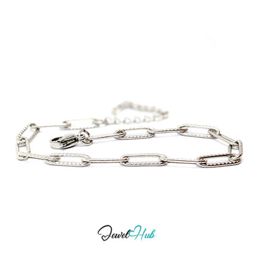 A silver paperclip chain bracelet with a lobster clasp, displayed on a clean white background 