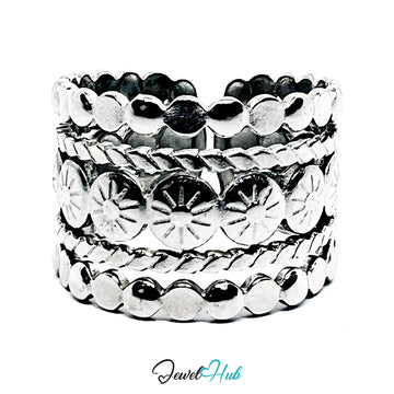 Set of silver rings with textured designs on a white background, branded 'Jewel Hub'.