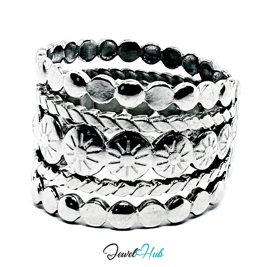 Set of silver rings with textured designs on a white background, branded 'Jewel Hub'.