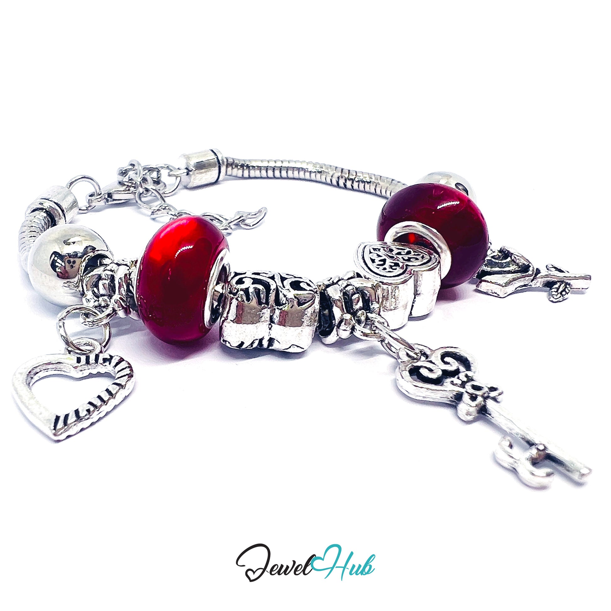 Silver bracelet with red beads and charms on a white background, branded 'Jewel Hub'.