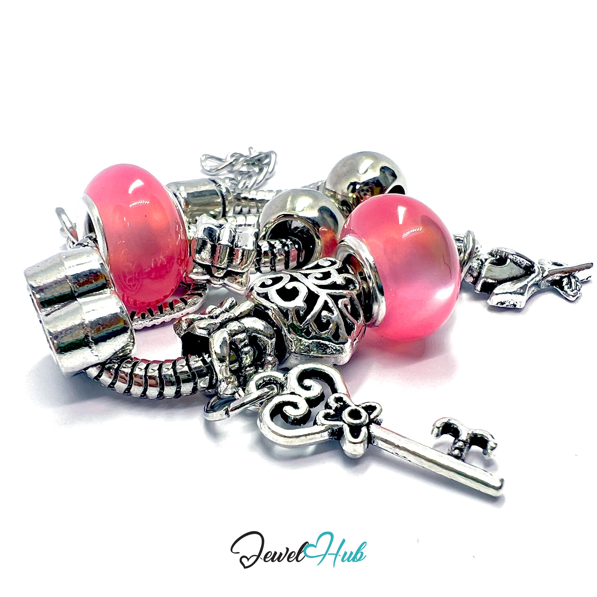 Silver charm bracelet with pink beads and a key charm on a white background, branded 'Jewel Hub'.