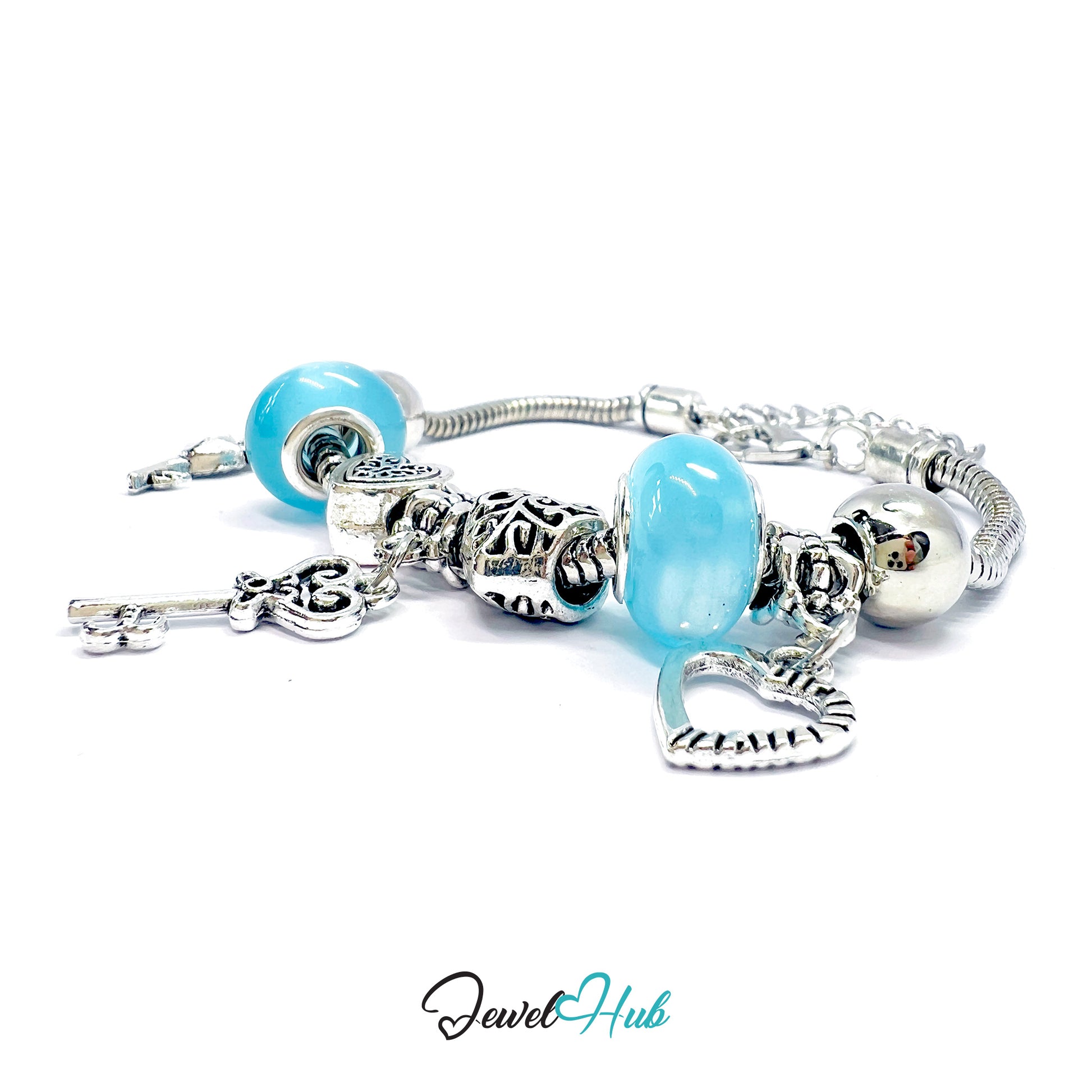 Silver bracelet with blue beads on a white background, branded 'Jewel Hub'.